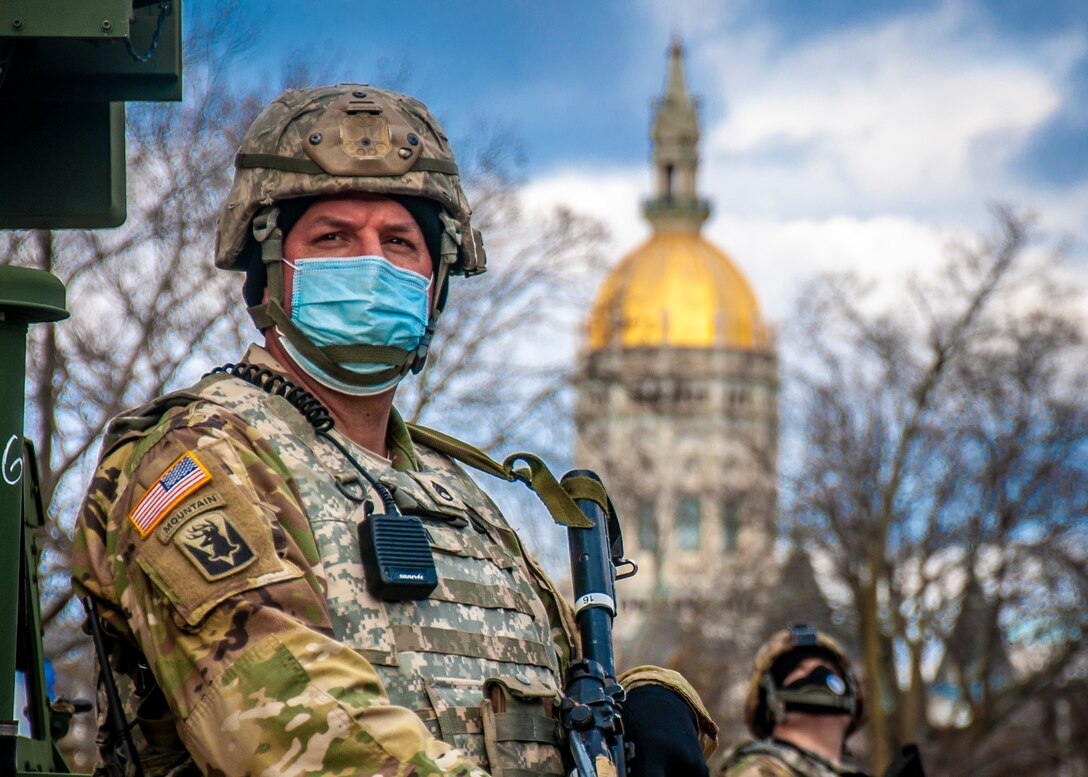 A Soldier assigned to the Connecticut National Guard stands guard in Hartford, Conn. Jan. 17, 2021. At the request of Governor Ned Lamont, the National Guard was called up to assist local, state and Capitol police with protecting key infrastructure around the state capitol following an FBI advisory issued in the wake of the events of Jan. 6 in Washington D.C.