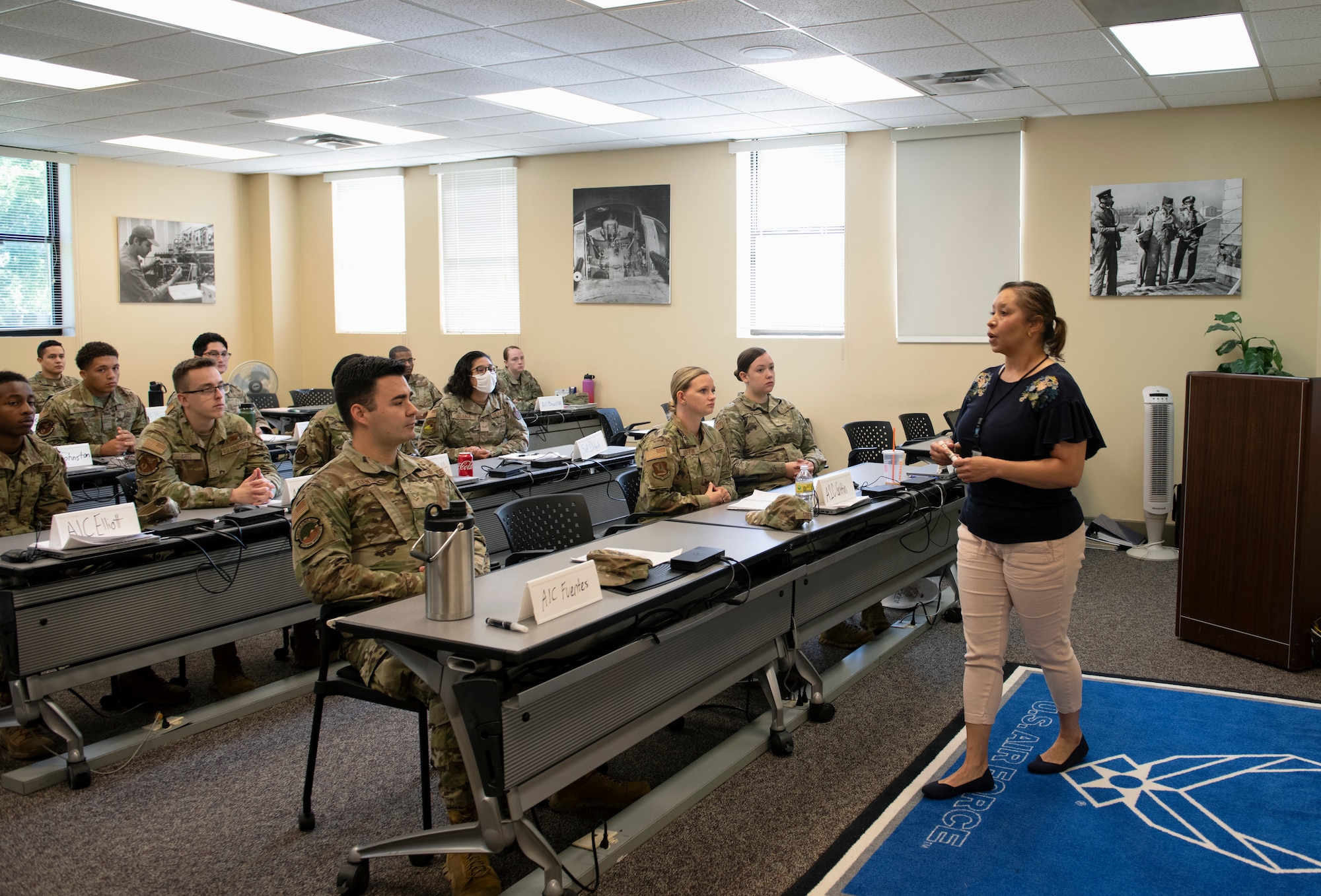 Maxwell AFB --Dominque Torres, 42nd Air Base Wing Community Support Coordinator, briefs airmen during an Airman Professional Enhancement course April 27, 2022. The three day course covered topics of Why We Fight, Developing Followership and Self Development. (U.S. Air Force photo by Senior Airman Rhonda Smith)