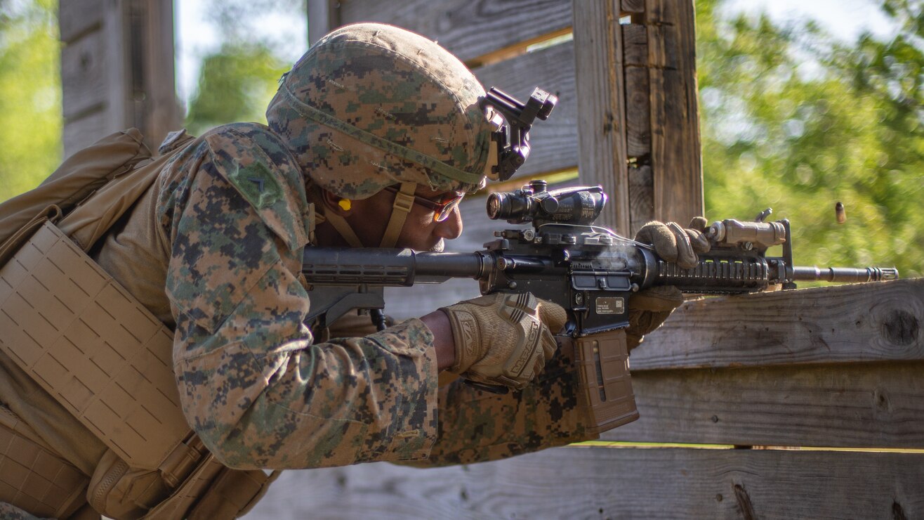 U.S. Marine Corps Pfc. Tykeim Simoneaux, a Vacherie, Louisiana, native and rifleman with 2d Light Armored Reconnaissance Battalion, 2d Marine Division, fires his rifle during a Combat Marksmanship Competition on Camp Lejeune, N.C., April 27, 2022. The purpose of this course of fire is to test the limit of the Marines’ shooting capabilities under physical exertion in order to develop proficiency in their individual skills and increase the lethality of the unit.