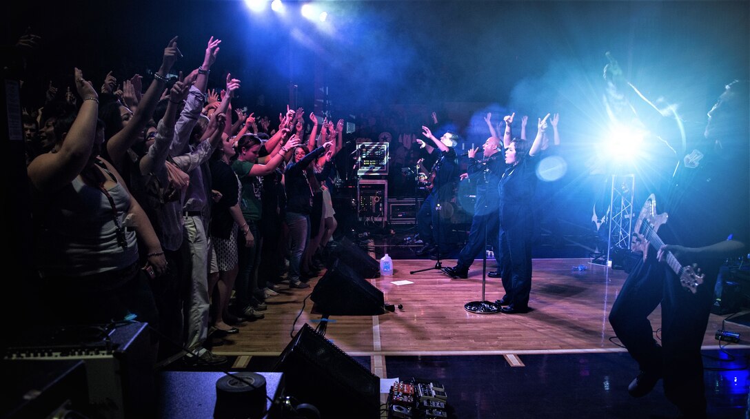 Langley band performing on stage to exciting crowd