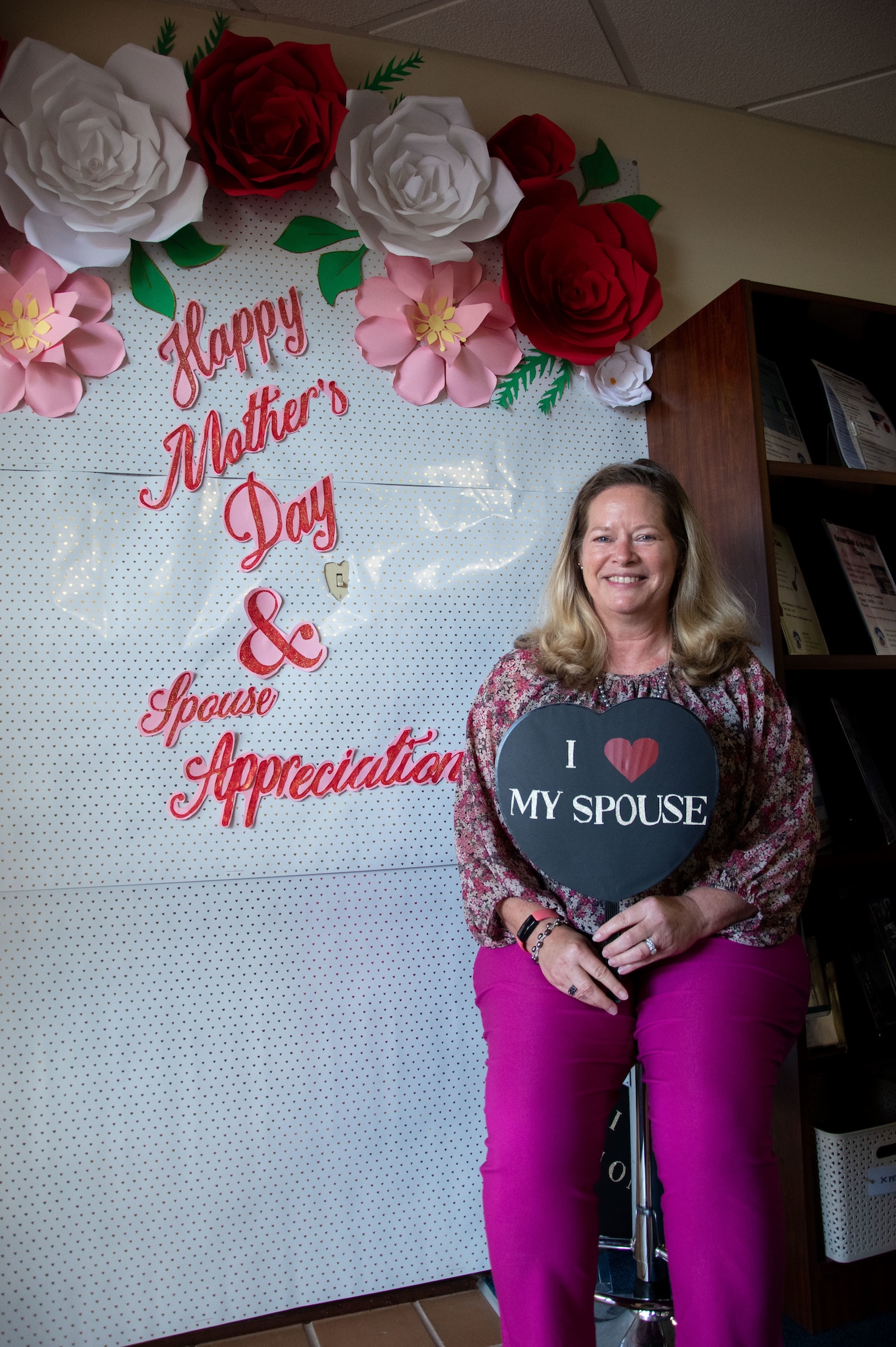 A woman poses for a picture