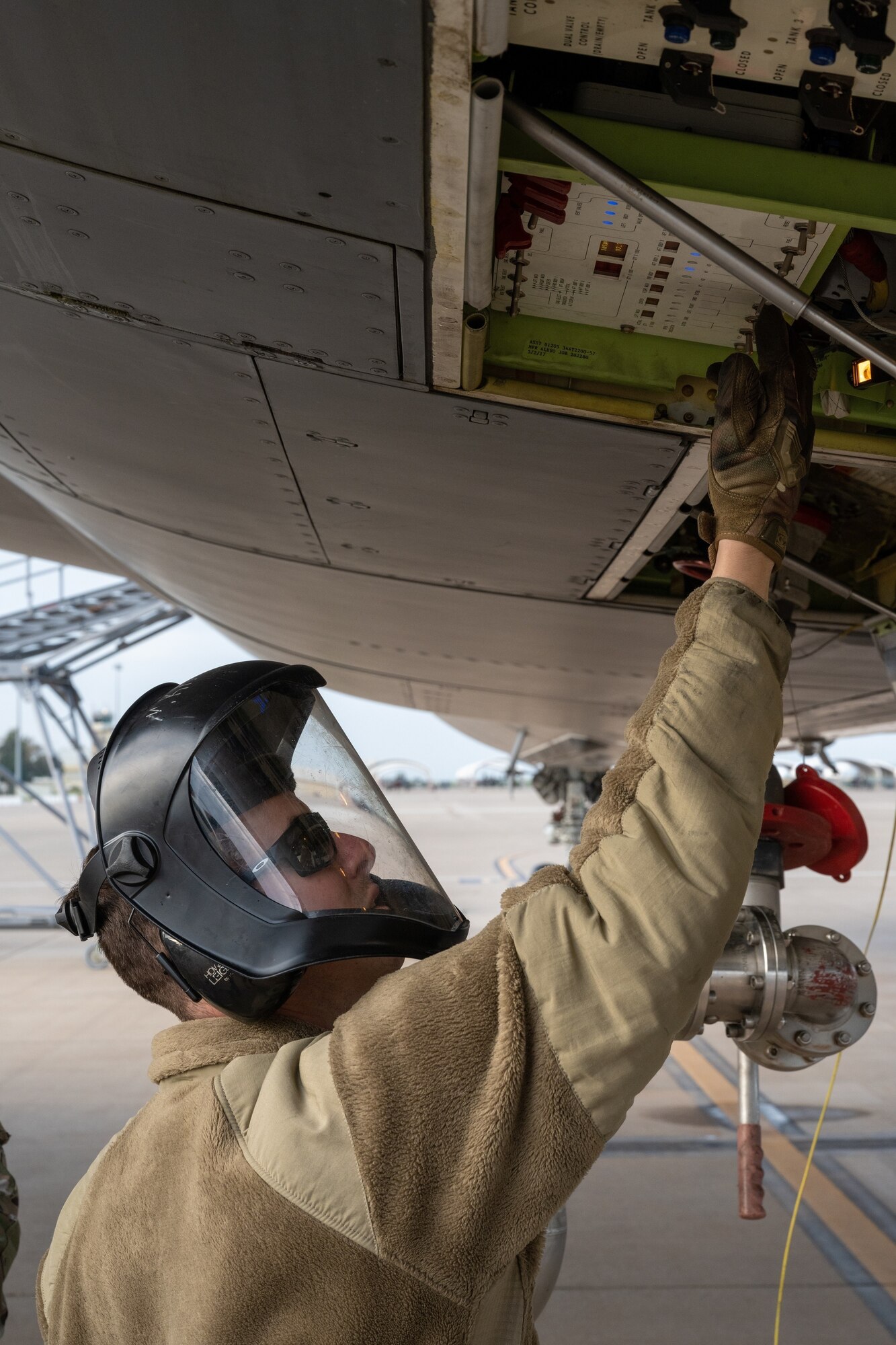 Technical Sgt. Eric Yates, 22nd Aircraft Maintenance Squadron crew chief, loads fuel to a KC-46A Pegasus to prepare it for the first flight of the Employment Concept Exercise (ECE) March 21, 2022, at Morón Air Base, Spain.