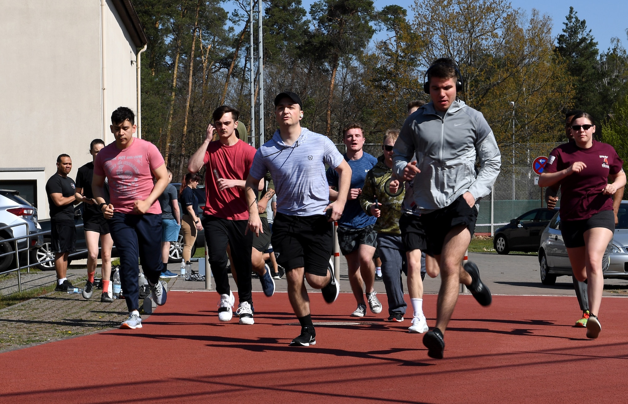 Airmen begin an 800 meter run.