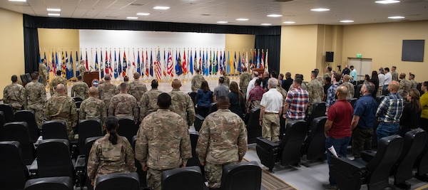 Maj. Gen. Kimberly Colloton, Commanding General of U.S. Army Corps of Engineers Transatlantic Division, hosts a Relinquishment of Command ceremony where the outgoing Expeditionary District Commander, Col. Kenneth N. Reed, who will transfer command of the district to interim Expeditionary District Commander, Lt. Col. Peter M. Ammerman, April 25, 2022, at Camp Arifjan, Kuwait.