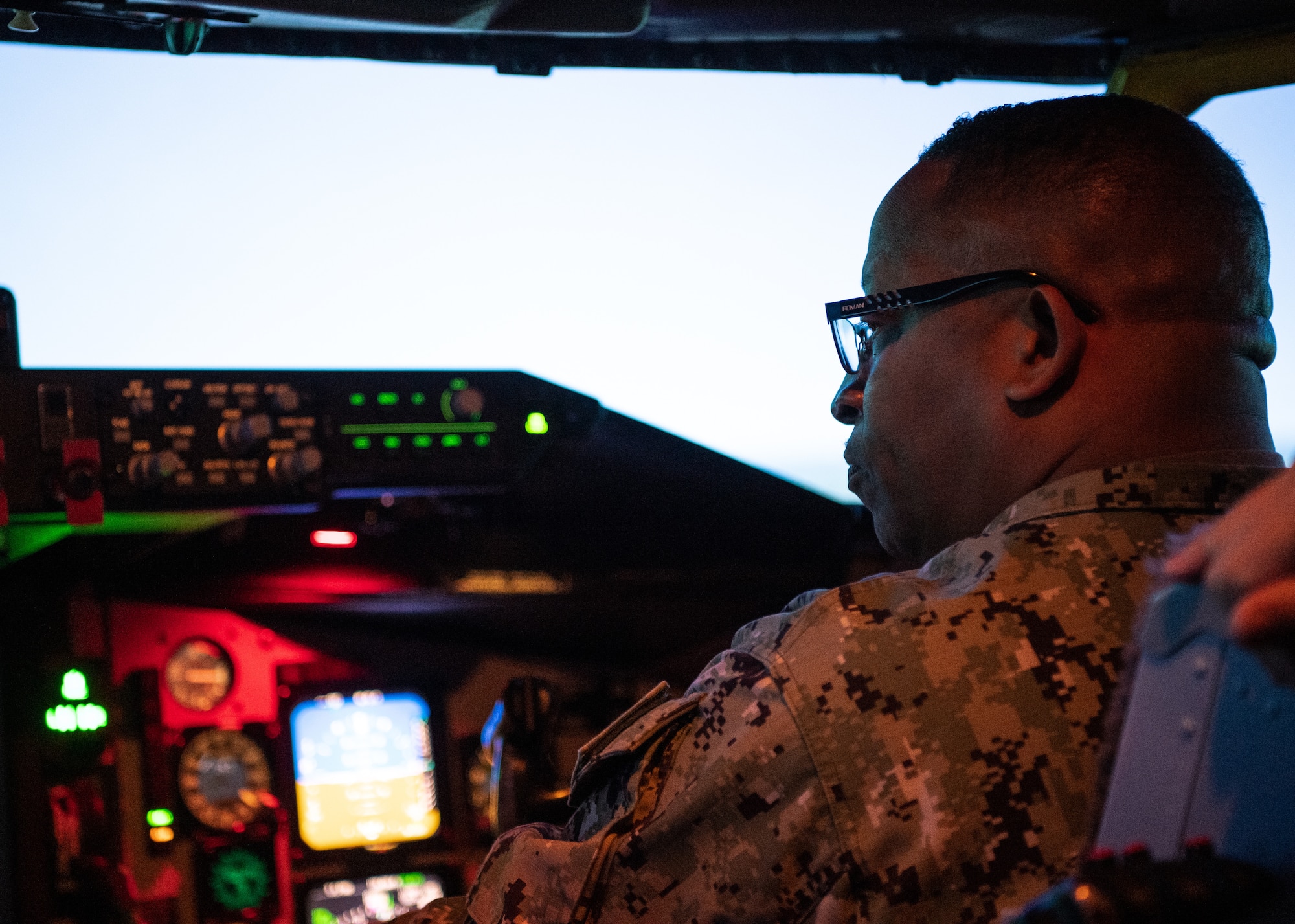 U.S. Navy Fleet Master Chief Donald Myrick, U.S. Transportation Command senior enlisted leader, pilots a KC-135 Stratotanker simulator during a tour at MacDill Air Force Base, Florida, April 29, 2022. Myrick visited the training section to learn their role in producing qualified and certified crewmembers and how they use simulator training systems to maintain a mission ready force. (U.S. Air Force photo by Staff Sgt. Alexander Cook)