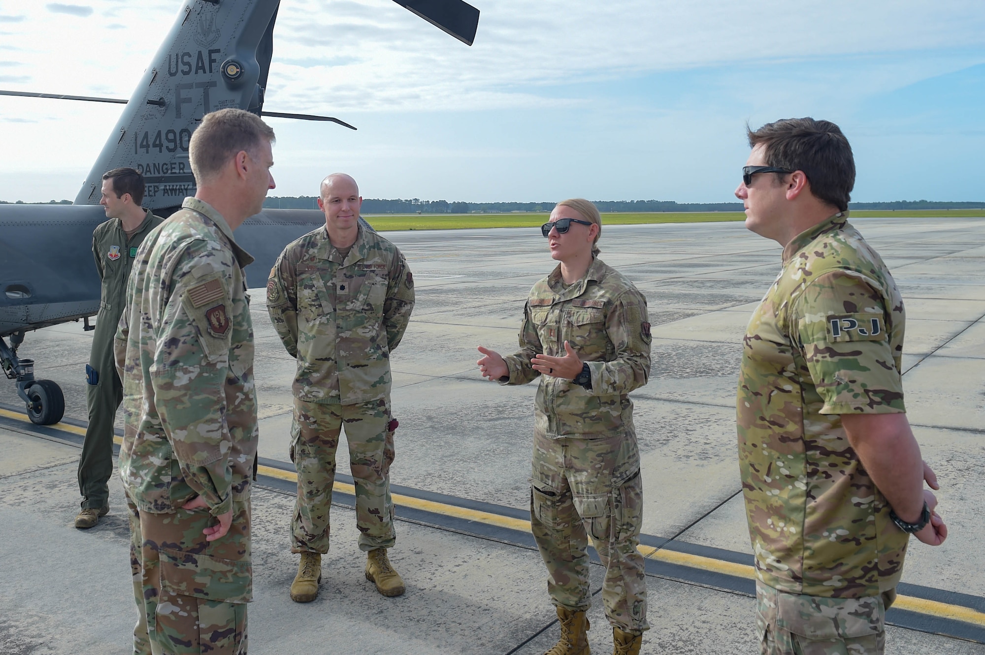 A photo of Airmen talking.