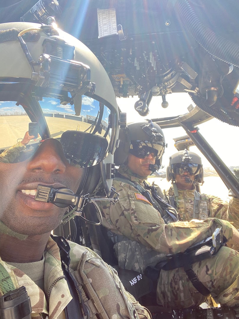 Chief Warrant Officer (2) Aendri Decker, Chief Warrant Officer (2) George Frimpong and Sgt. Jonathan Blair (left to right), all representing 1st Battalion, 106th Aviation Regiment as the Illinois Army National Guard’s first African-American flight crew pose for a photograph March 31, 2022 in Kankakee, Illinois. The three hope to inform other African-Americans of the opportunities to fly aircrafts in the military. (photo courtesy of Chief Warrant Officer (2) George Frimpong)