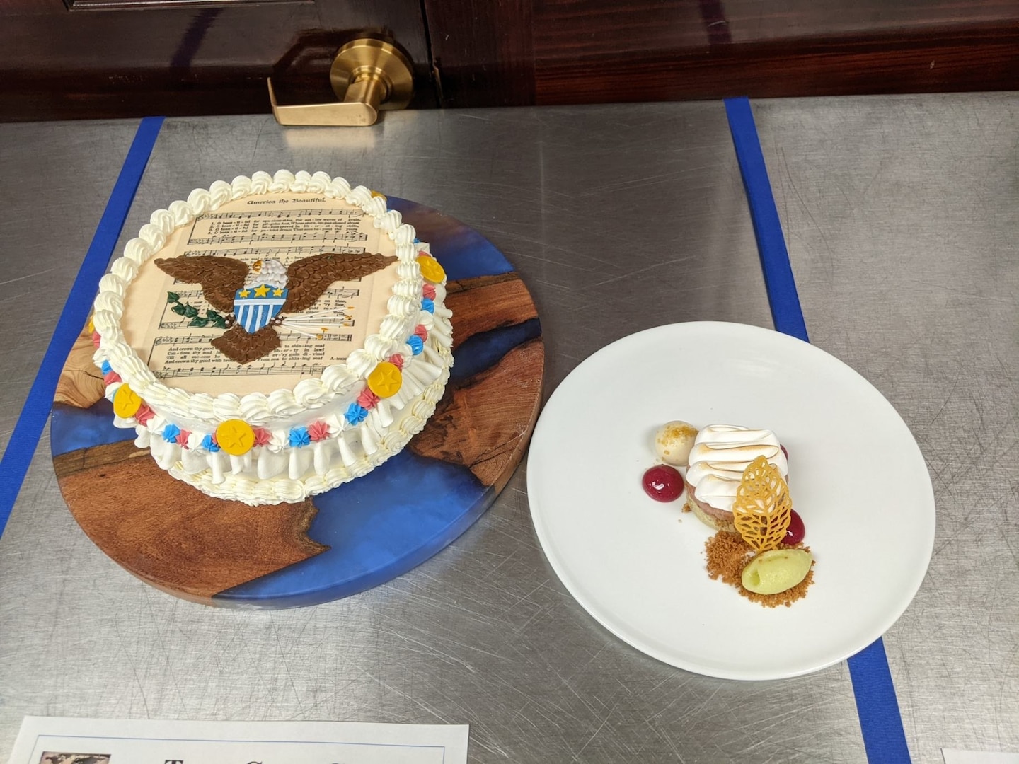 The winning pastry dishes, created by Chief Petty Officer Matthew Shaw, March 10, 2022. Shaw won the gold medal in the Military Pastry Chef of the Year category after creating celebration cake, named Vintage American, and four plates of the apple pie and cheese dish within three hours. USCG photo.