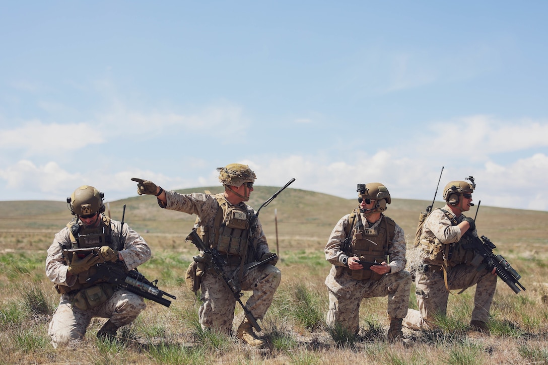 U.S. Marine Corps Joint Terminal Attack Controller students with 1st Marine Division coordinate close air support for an urban assault at Saylor Creek Range in Grasmere, Idaho during Exercise Garnet Rattler April 28, 2022. Garnet Rattler is a joint training event between Marines, Soldiers and Airmen to train and qualify JTACs to be more efficient and lethal in a realistic training environment.