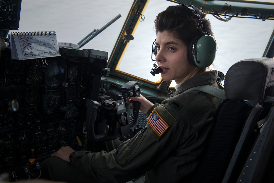 Air Force 1st Lt. Jennifer Petrow, a pilot assigned to the 118th Airlift Squadron, flies a C-130 H aircraft enroute to Washington, D.C., January 15, 2021, East Granby, Connecticut. Guardsmen were mobilized in support of security operations in the days leading up to the United States presidential inauguration. (Air National Guard photo by Tech. Sgt. Tamara R. Dabney)