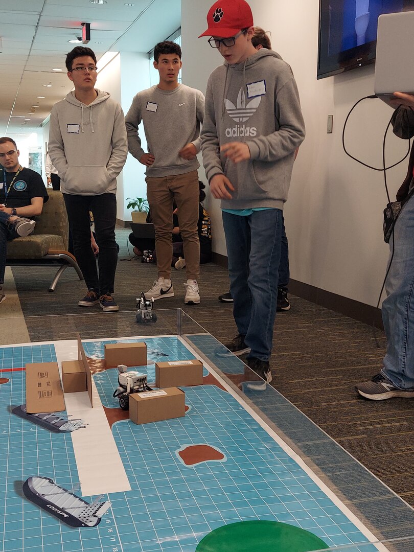IMAGE: Students begin programming their robots on day one of the Innovation Challenge @Dahlgren.