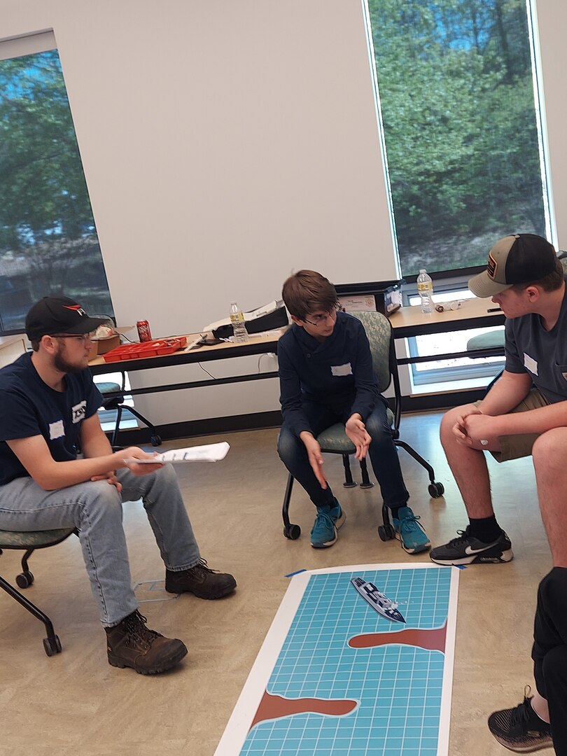 IMAGE: Students begin work on programming their robots on day one of the Innovation Challenge @Dahlgren.