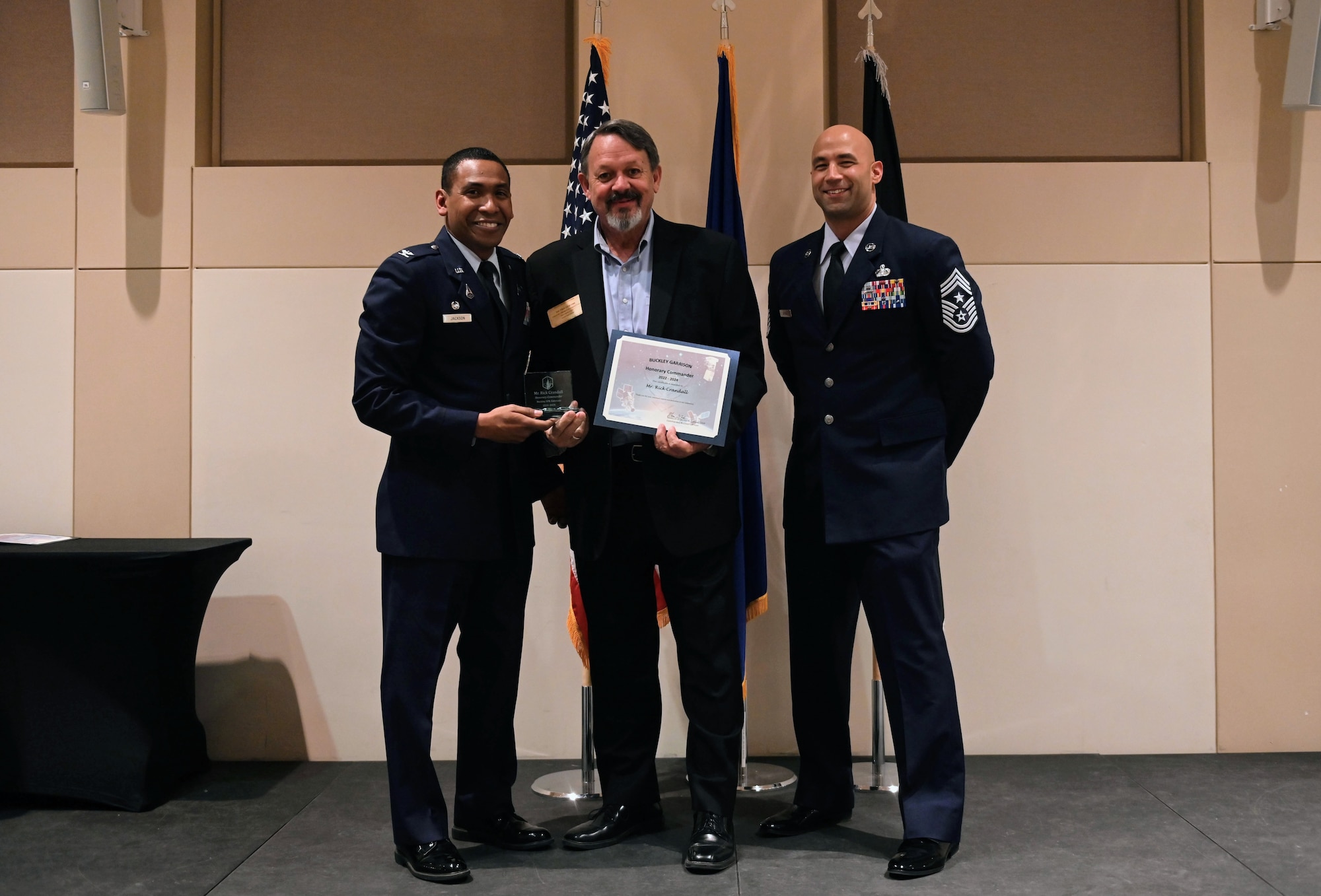 Col. Marcus Jackson, Buckley Garrison commander, welcomes Rick Crandall, the president of the Colorado Freedom Memorial, as a newly inducted member of the Honorary Commander’s Program at Buckley Space Force Base, Colo., March 16, 2022.