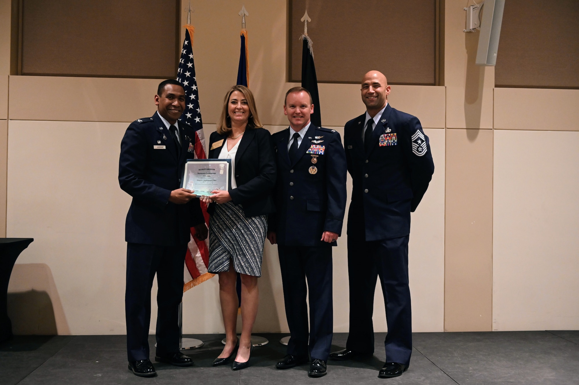 Col. Marcus Jackson, Buckley Garrison commander, welcomes Stephanie Piko, the mayor of Centennial, as a newly inducted member of the Honorary Commander’s Program at Buckley Space Force Base, Colo., March 16, 2022.