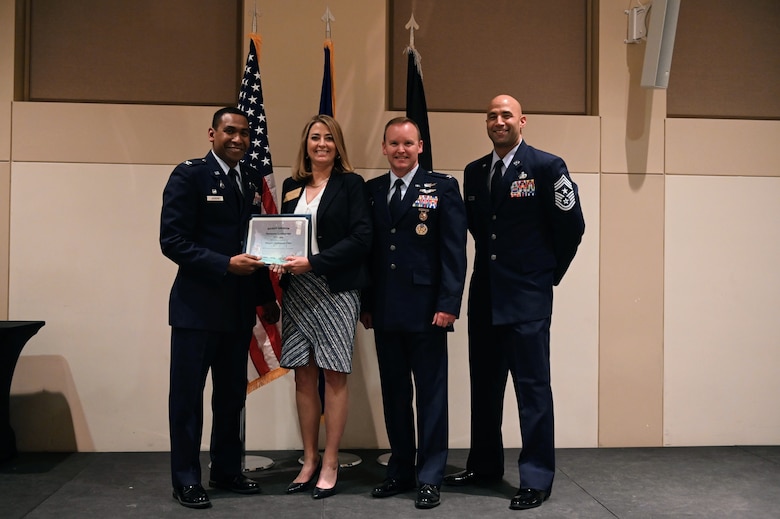Col. Marcus Jackson, Buckley Garrison commander, welcomes Stephanie Piko, the mayor of Centennial, as a newly inducted member of the Honorary Commander’s Program at Buckley Space Force Base, Colo., March 16, 2022.