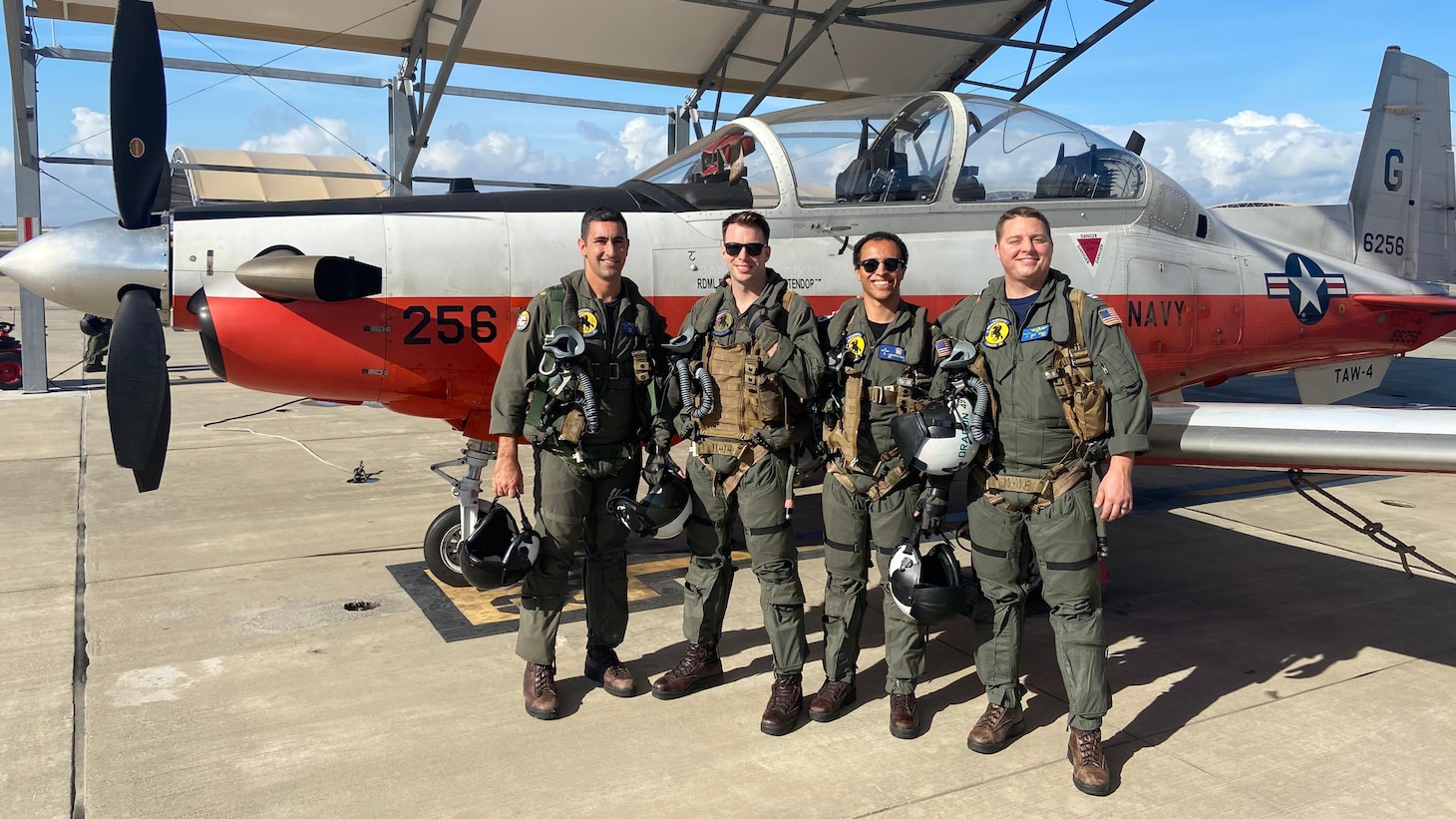 Navy Reserve pilots and active duty student aviators assist civilian aircraft in distress