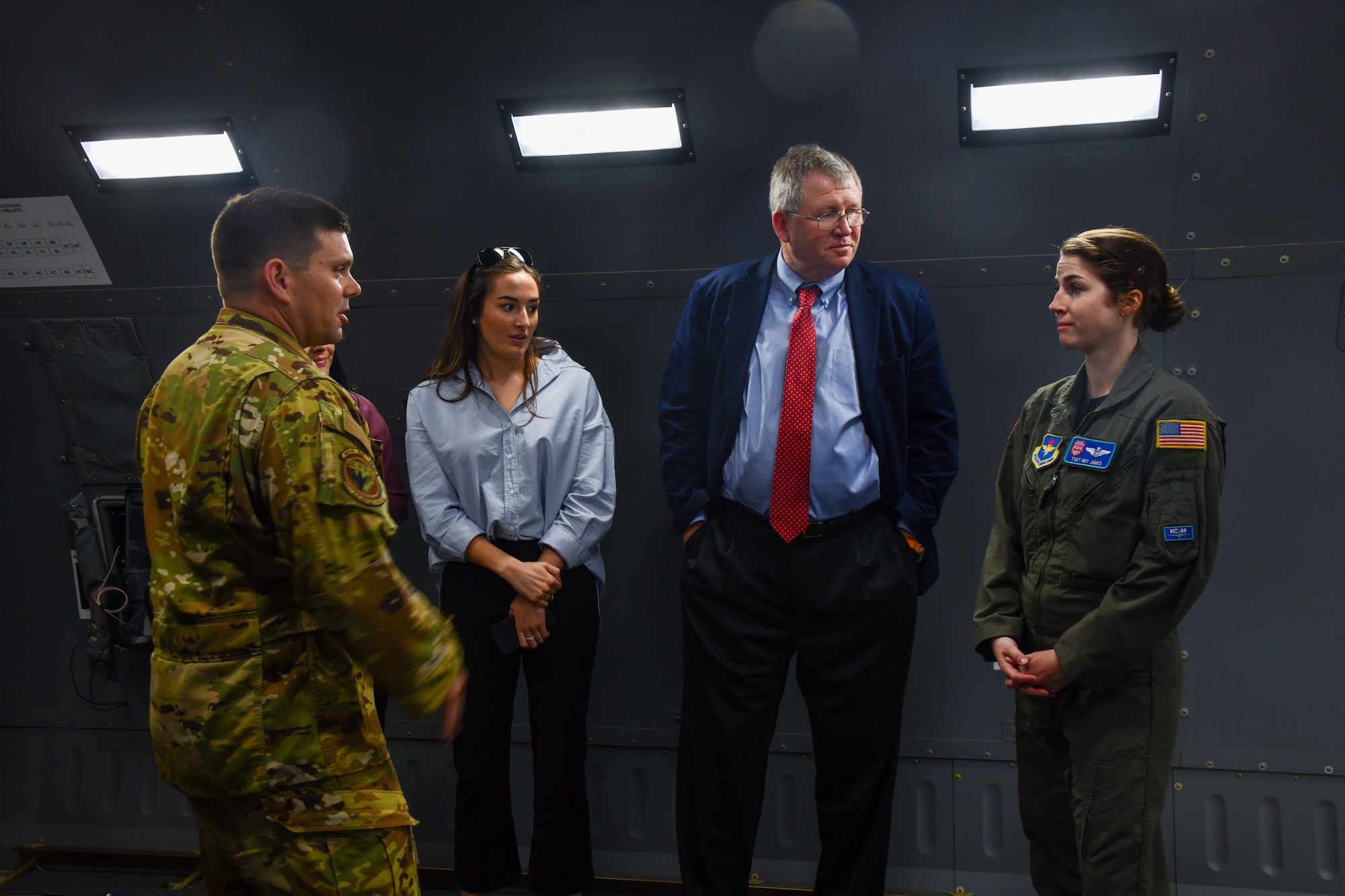 U.S. Air Force Lt. Col. Adam Boyd (left), 56th Air Refueling Squadron (ARS) commander, and Tech. Sgt. Amy James (right), 56th ARS chief of student management, gives a tour of a KC-46A Pegasus to Rep. Frank Lucas, Oklahoma congressman, and his team at Altus Air Force Base, Oklahoma, April 22, 2022. The KC-46A’s modernized cargo deck can accommodate a mixed load of passengers, patients and cargo and brings enhanced safety features to the mission. (U.S. Air Force photo by Airman 1st Class Miyah Gray)