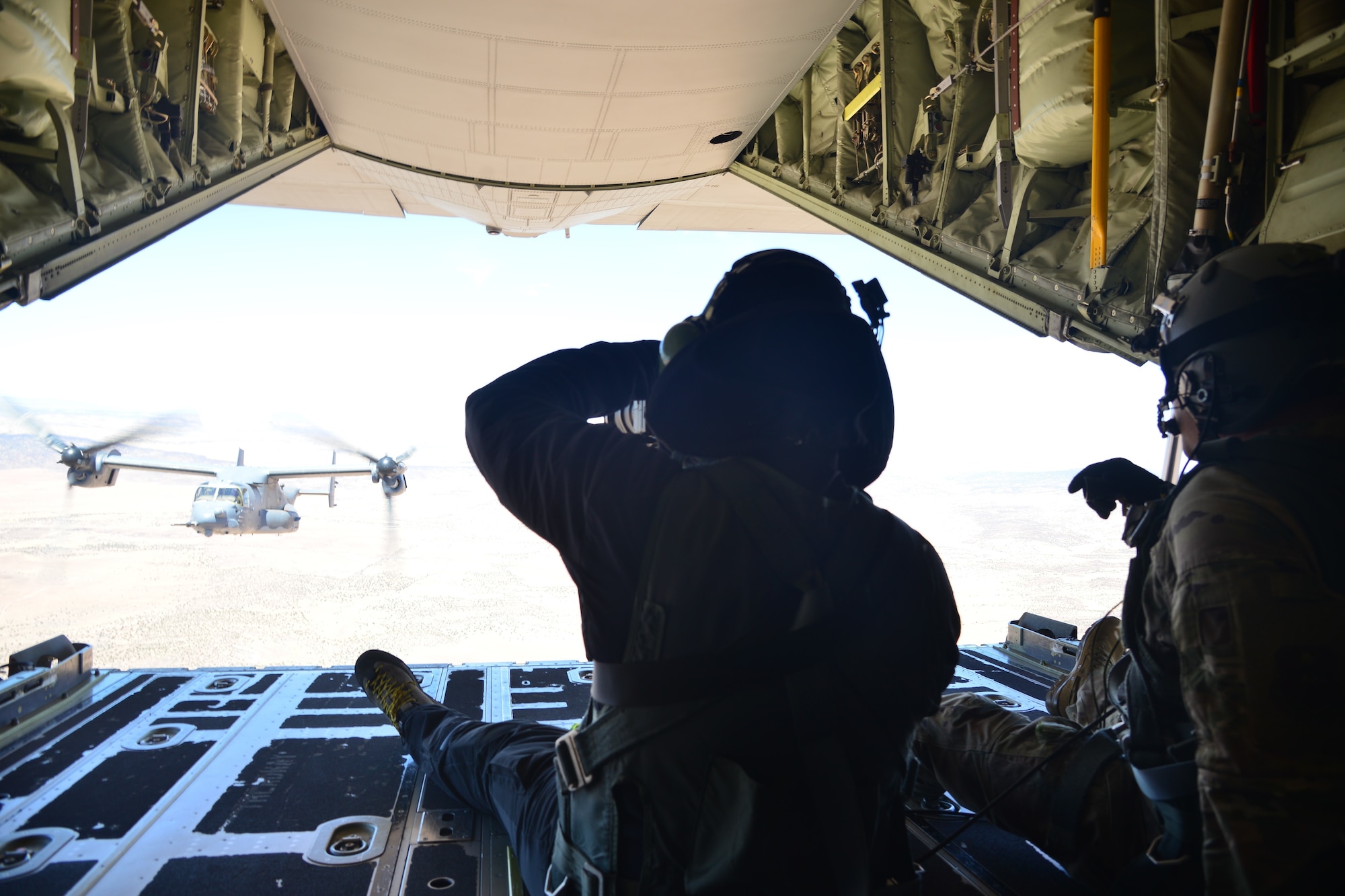 Photographer takes picture of aerial refueling