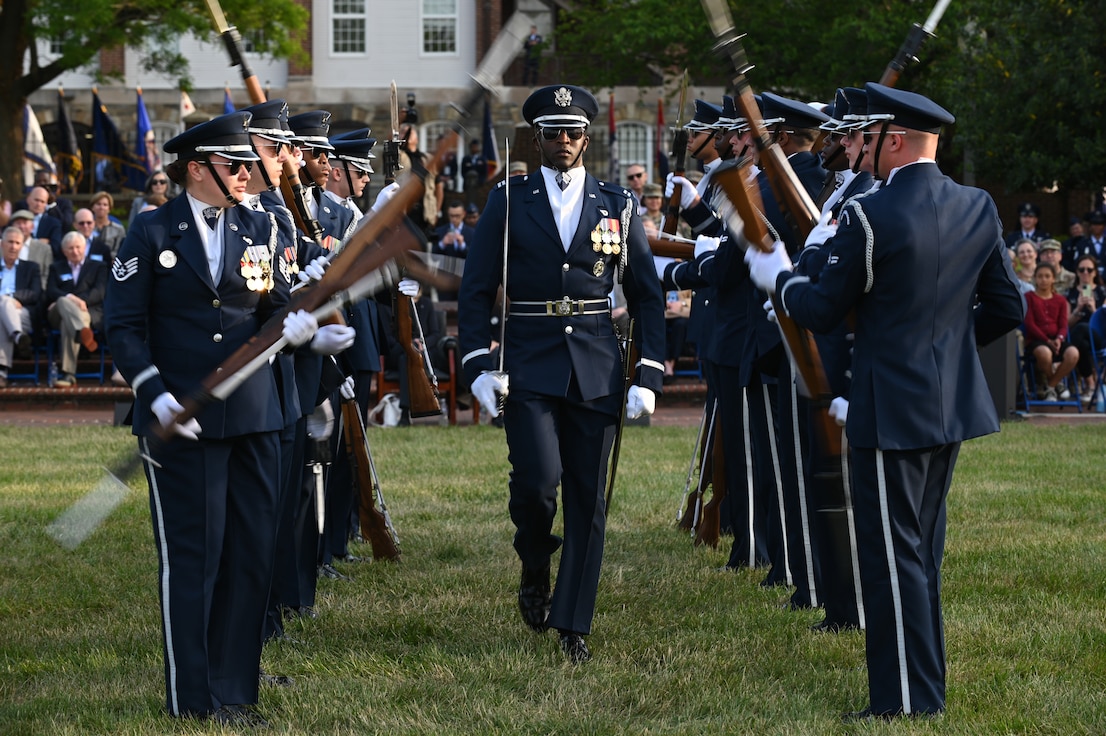 Airmen of the U.S. Air Force Honor Guard demonstrate military bearing and precision in a performance at the U.S. Air Force Spring Tattoo May 3, 2022, on the Air Force Ceremonial Lawn on Joint Base Anacostia-Bolling, Washington D.C. The mission of the Air Force Honor Guard is to represent all Airmen in the U.S. Air Force by demonstrating military excellence, precision and discipline while inspiring patriotism in audiences worldwide. (U.S. Air Force photo by Airman 1st Class Anna Smith)
