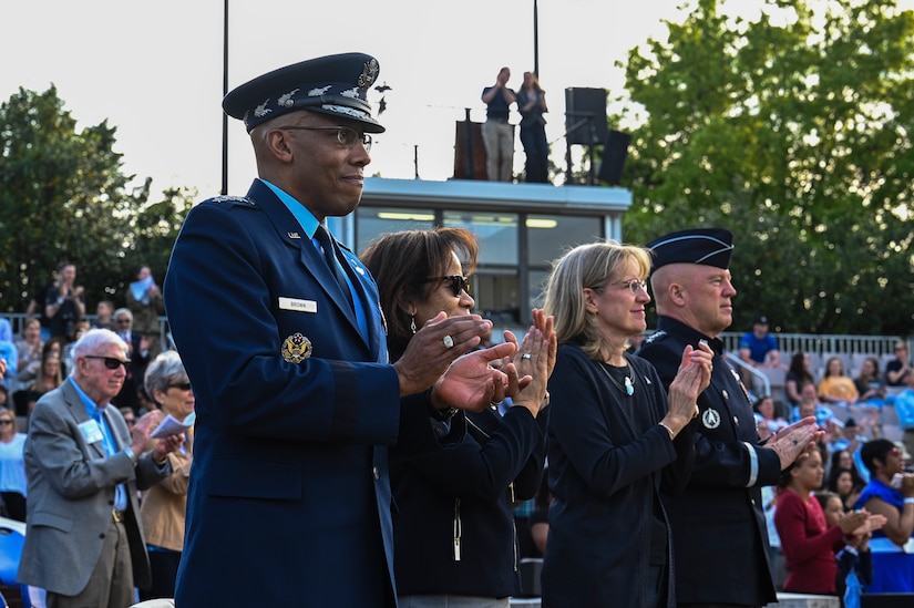 U.S. Air Force Chief of Staff Gen. CQ Brown, Jr. and distinguished guests applaud the performance by The United States Air Force Band on the Air Force Ceremonial Lawn at Joint Base Anacostia-Bolling, Washington, D.C., May 3, 2022. The historic, multi-demonstration event of military pomp and ceremony was presided over by Air Force Chief of Staff Gen. CQ Brown, Jr. The key features of the Tattoo included performances by The United States Air Force Band and U.S. Air Force Honor Guard. The members of the Band and Honor Guard share a common mission of representing Air Force values and helping to foster a community across our nation and with our international allies. (U.S. Air Force photo by Airman Bill Guilliam)