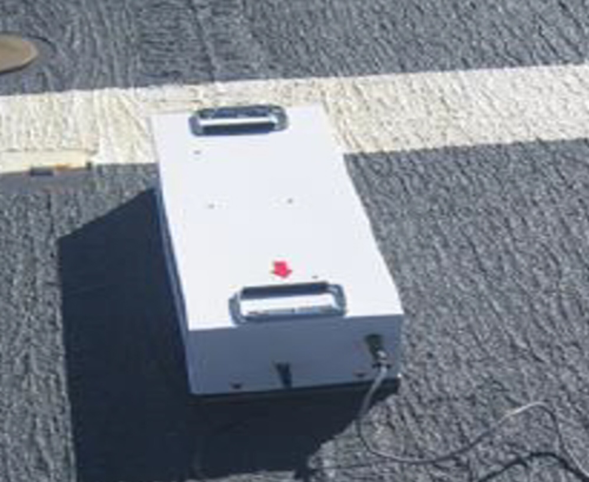 Scanner sitting on runway