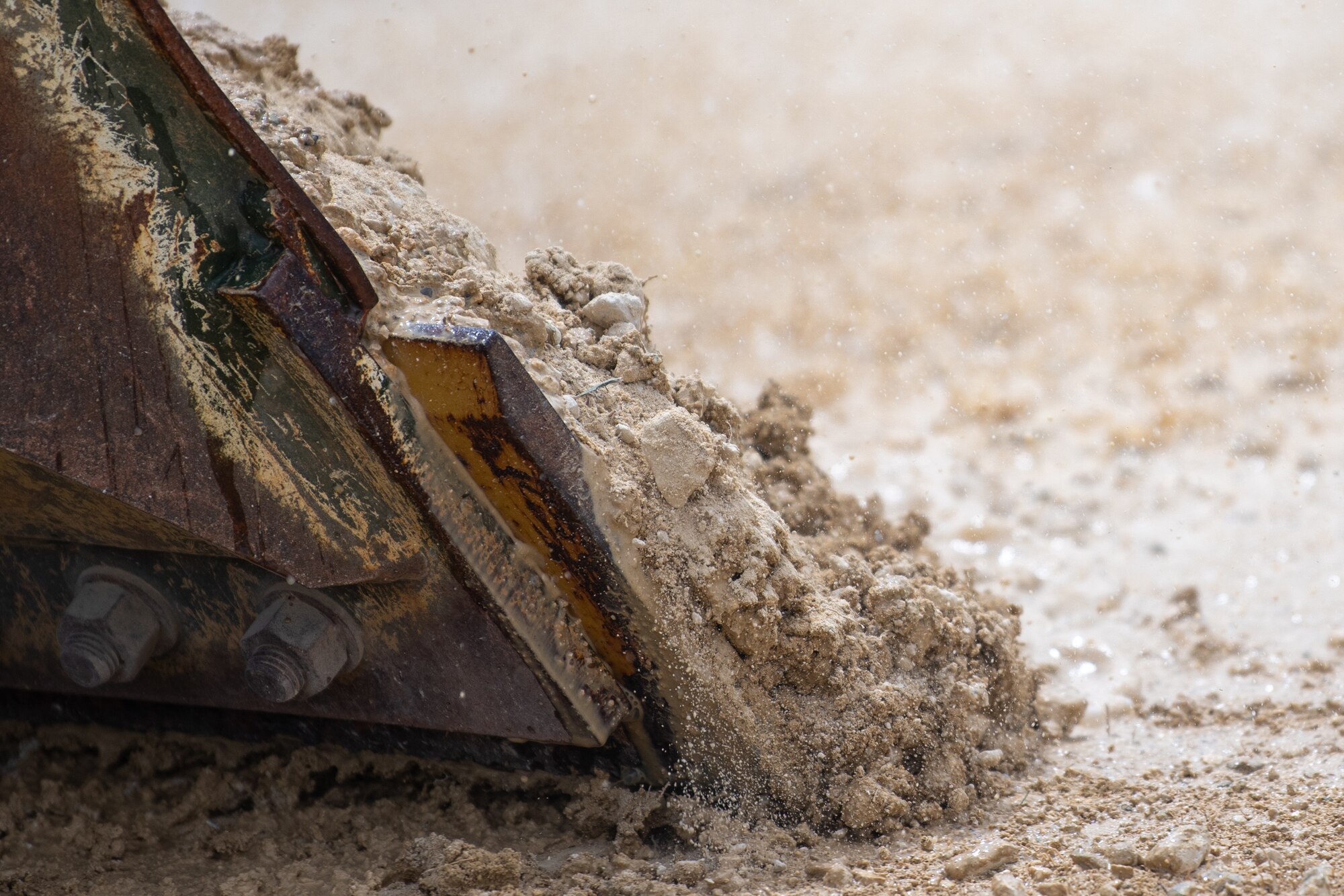 A dozer moves dirt.