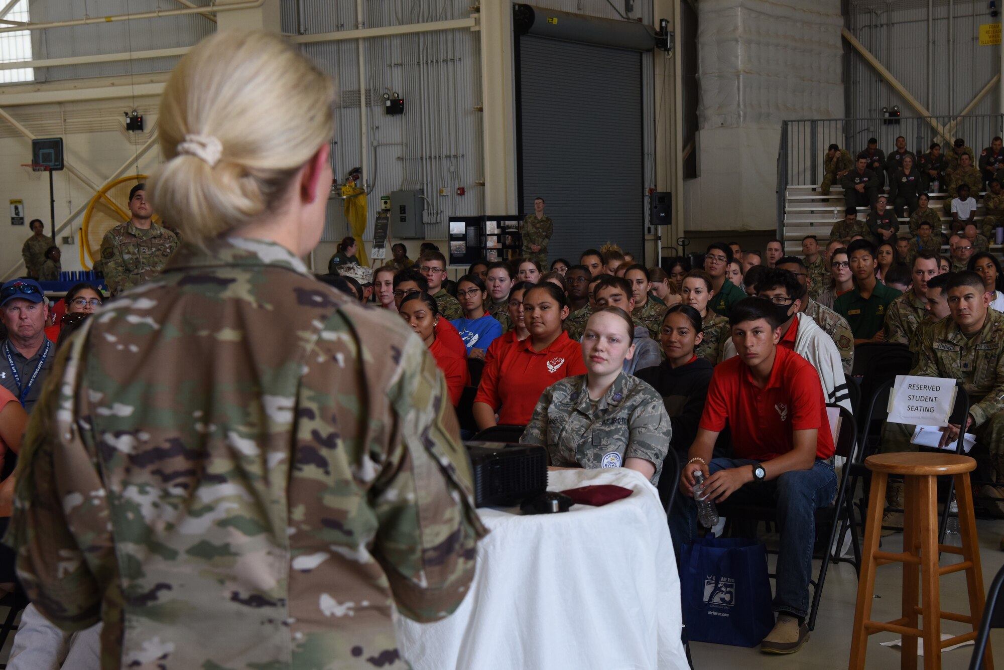 Maj. Gen. Laura L. Lenderman, Air Mobility Command director of operations for strategic deterrence and nuclear integration, answers the questions of ROTC students at Dyess Air Force Base, Texas, April 29, 2022. The Women Airforce Service Pilots inspired generations of women into military service, including pilot Terry Rinehart, one of the first 10 women to be hired as a commercial pilot, and Col. Kimberly Olsen, one of the first female pilots in the Air Force. (U.S. Air Force Photo by Senior Airman Sophia Robello)