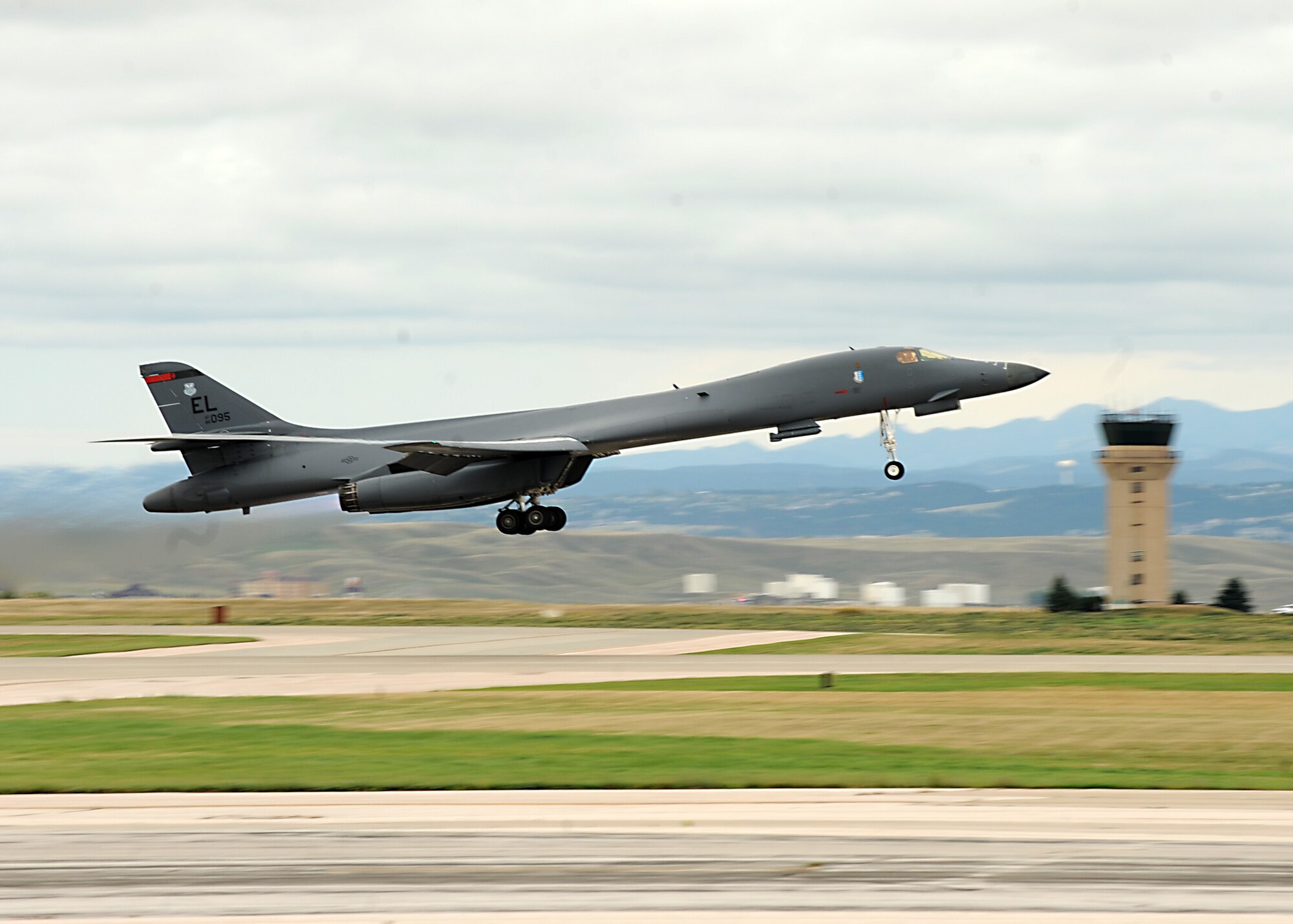 A B-1 bomber takes off from the runway while using full afterburners at Ellsworth Air Force Base, S.D., Sept. 12, 2016. The take-off was an opportunity to showcase the capabilities of the B-1 as part of a visit by international defense attachés from all over the world. (U.S. Air Force photo by Airman 1st Class Marshall L. Brown)