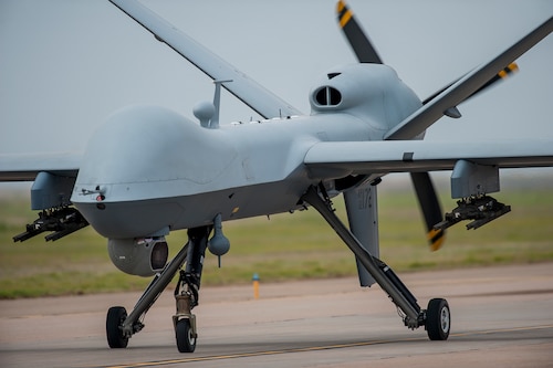 An MQ-9 Reaper performs a low pass during a first-ever air show demonstration May 29, 2016, at Cannon Air Force Base, N.M. The 2016 Cannon Air Show highlights the unique capabilities and qualities of Cannon's Air Commandos and also celebrates the long-standing relationship between the 27th Special Operations Wing and the High Plains community.  (U.S. Air Force photo/Master Sgt. Dennis J. Henry Jr.)