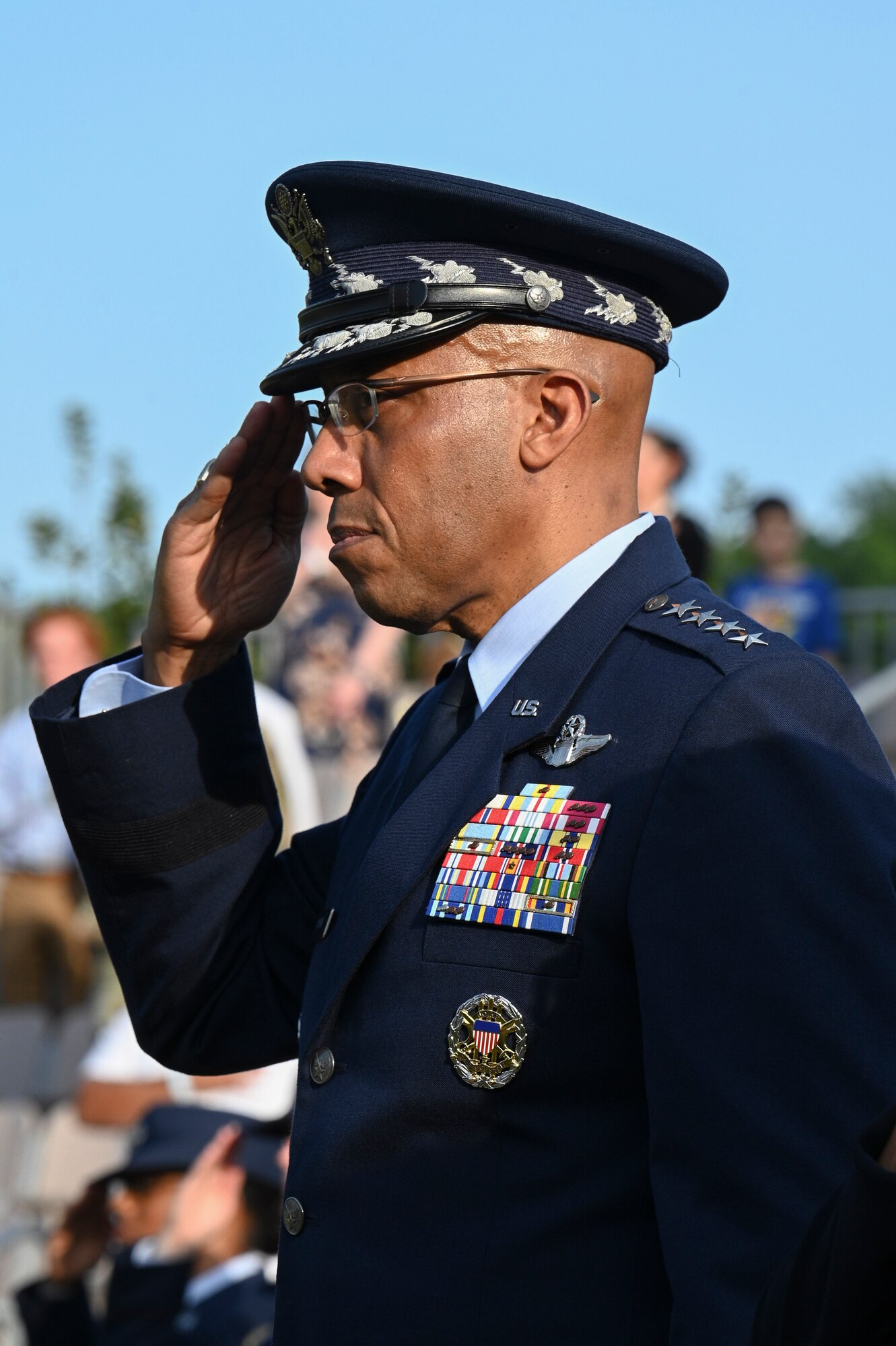 U.S. Air Force Chief of Staff Gen. CQ Brown, Jr., salutes during the national anthem performed by The United States Air Force Band during the U.S. Air Force’s 75th Birthday Celebration Spring Tattoo on the Air Force Ceremonial Lawn at Joint Base Anacostia-Bolling, Washington, D.C., May 3, 2022. Through world-class musical presentations and ceremonies, The U.S. Air Force Band helps create bonds between the United States and the worldwide community. Using music to bridge language, cultural, societal and socio-economic differences, the Band's performances advance international relationships and inspire positive and long-lasting impressions of the U.S. Air Force and the United States of America. (U.S. Air Force photo by Airman Bill Guilliam)