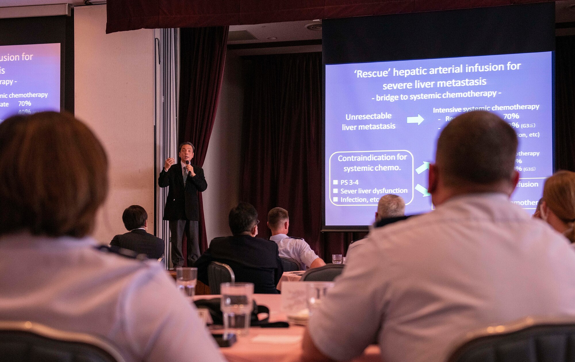 A representative presents a medical case study to an audience