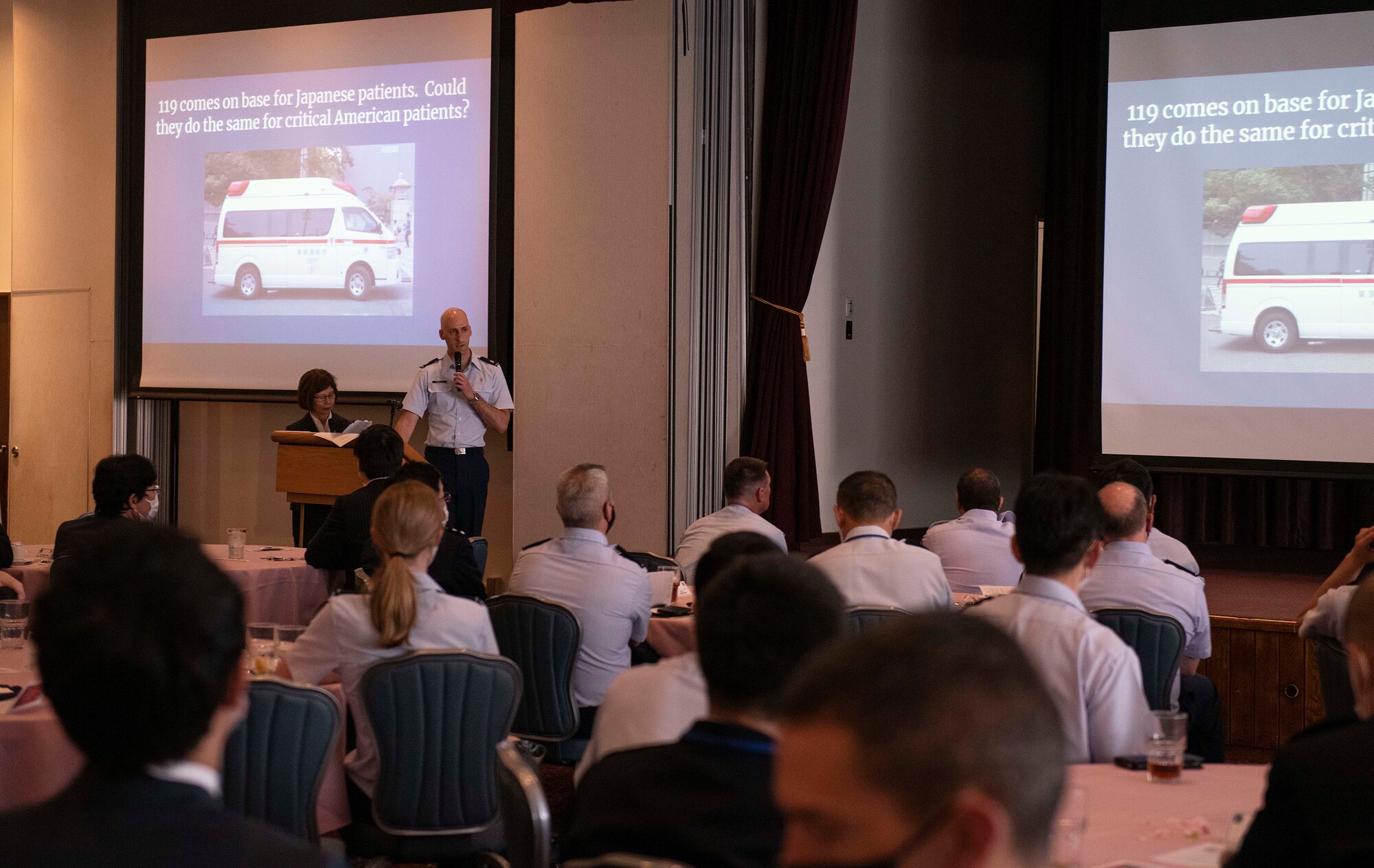 A U.S. Air Force Airman speaks to an audience