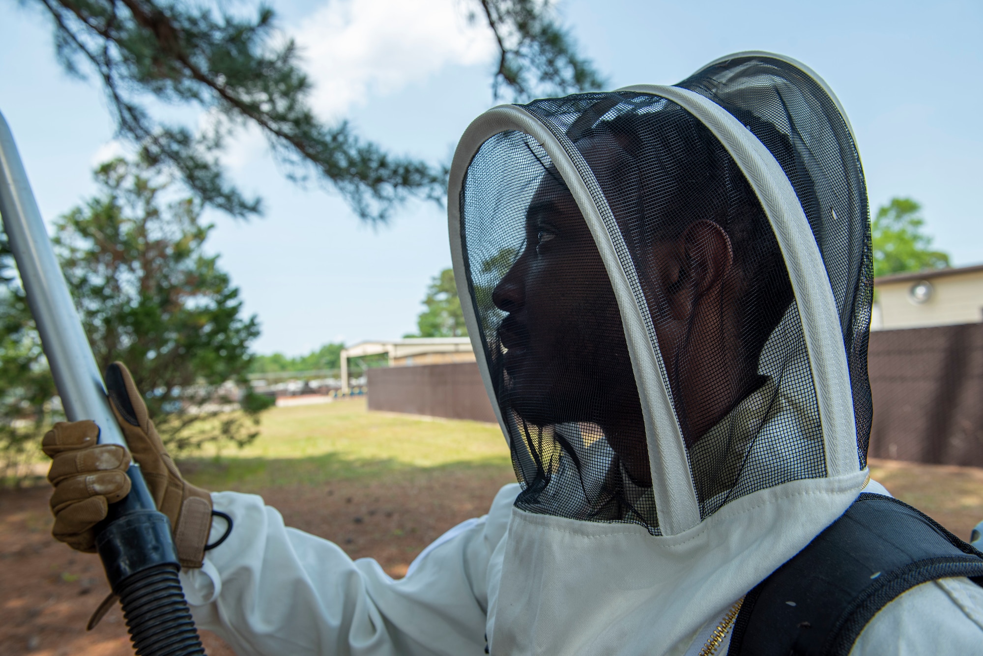 Airman 1st Class Evan Orr, 4th Civil Engineer Squadron pest management journeyman, sprays a wasp nest at Seymour Johnson Air Force Base, North Carolina, May 3, 2022. Pest management works to prevent the increasing number of wildlife by removing or relocating animals and insects from the area before it negatively impacts the mission. (U.S. Air Force photo by Airman 1st Class Sabrina Fuller)