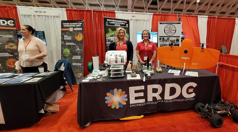 Jenny Laird and Lauren May, research biologists at the U.S. Army Engineer Research and Development Center’s Environmental Laboratory, and Katrina Burch, an associate technical director of the ERDC’s Cold Regions Research and Engineering Laboratory, exhibit at the Army Engineer Association Engineer Regimental Week industry exhibit in Fort Leonard Wood, Missouri, April 24-28, 2022. (U.S. Army Corps of Engineers photo by Annette Kirklin)