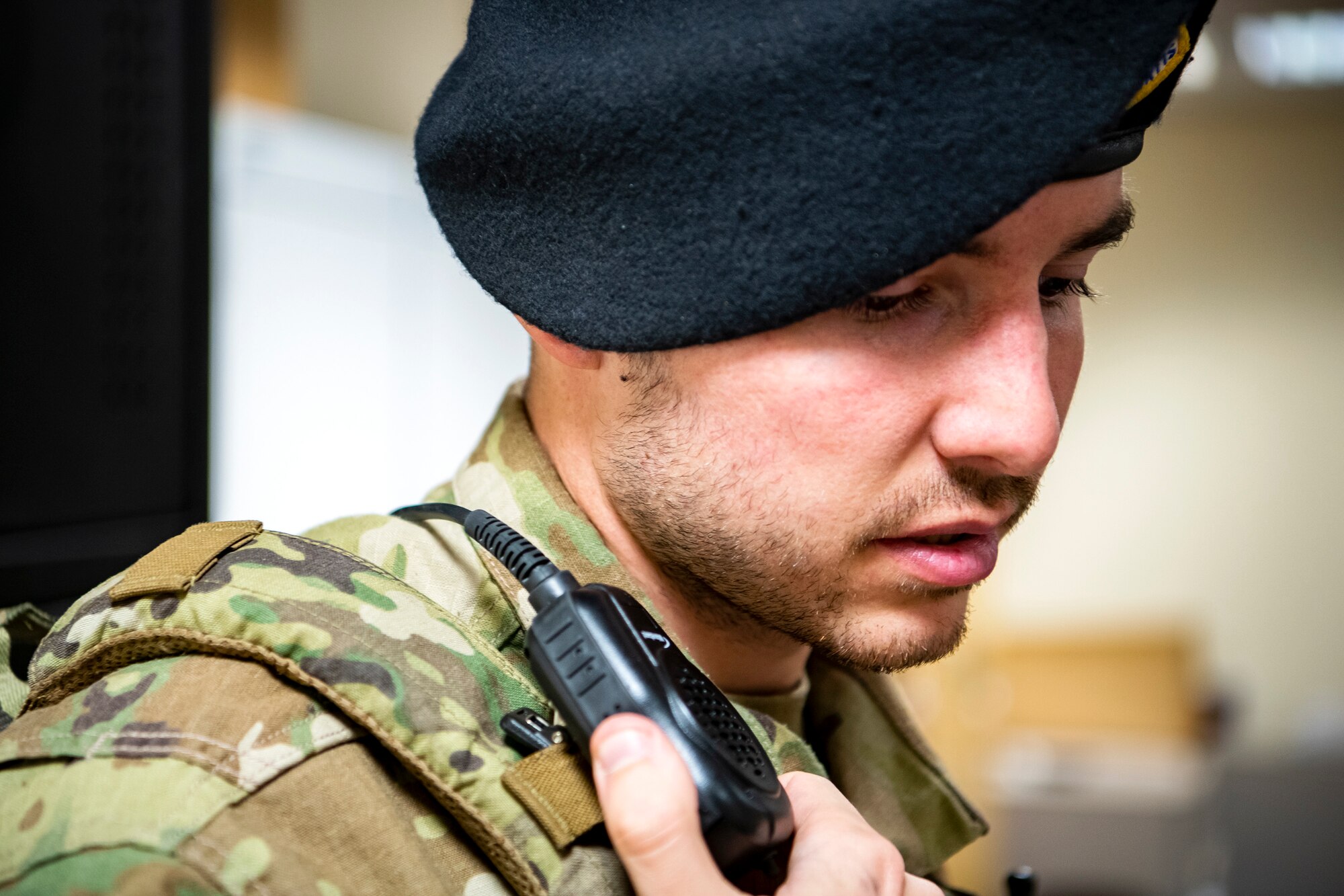 U.S. Air Force Staff Sgt. Elijah Allen, 423d Security Forces Squadron flight sergeant, speaks into his radio during a field training exercise at RAF Molesworth, England, 
April 27, 2022. The exercise was designed to evaluate the strengths and weaknesses of 423d SFS members' response to various scenarios including domestic disturbances, drunk driving and other base security incidents. (U.S. Air Force photo by Staff Sgt. Eugene Oliver)