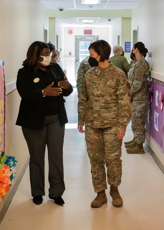 Chief Master Sgt. of the Air Force JoAnne S. Bass walks through the Child Development Center 2 at Joint Base Andrews, Md., April 27, 2022