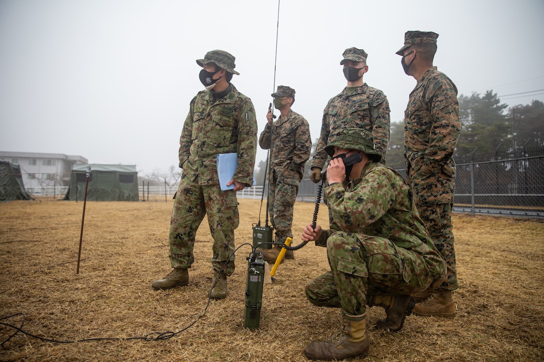 A soldier with the 1st Amphibious Rapid Deployment Regiment, Japanese Ground Self-Defense Force, performs a radio check at Combined Arms Training Center Camp Fuji, Japan, March 19, 2022. 1ARDR soldiers were taught when a field expedient antenna could be used as well as how to build one. Maritime Defense Exercise Amphibious Rapid Deployment Brigade is a bilateral exercise meant to increase interoperability and strengthen ties between U.S. and Japanese forces for the defense of Japan.
