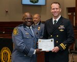 Lt. Cmdr. Chad Thompson, an Naval Medical Center Portsmouth (NMCP) Emergency Medicine resident, was recognized by the City of Suffolk at the annual award ceremony, April 5. The Suffolk Police Department awarded Thompson the Citizen’s Award for his selfless act of heroism at a motorcycle accident on May 8, 2021.