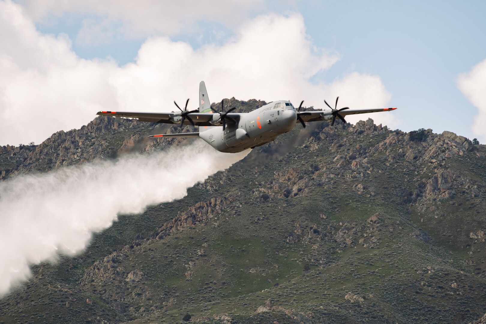 A California Air National Guard C-130J Super Hercules assigned to the 146th Airlift Wing flies a training route during the 2022 Modular Airborne Firefighting Systems spring training in Boise, Idaho, April 29, 2022.