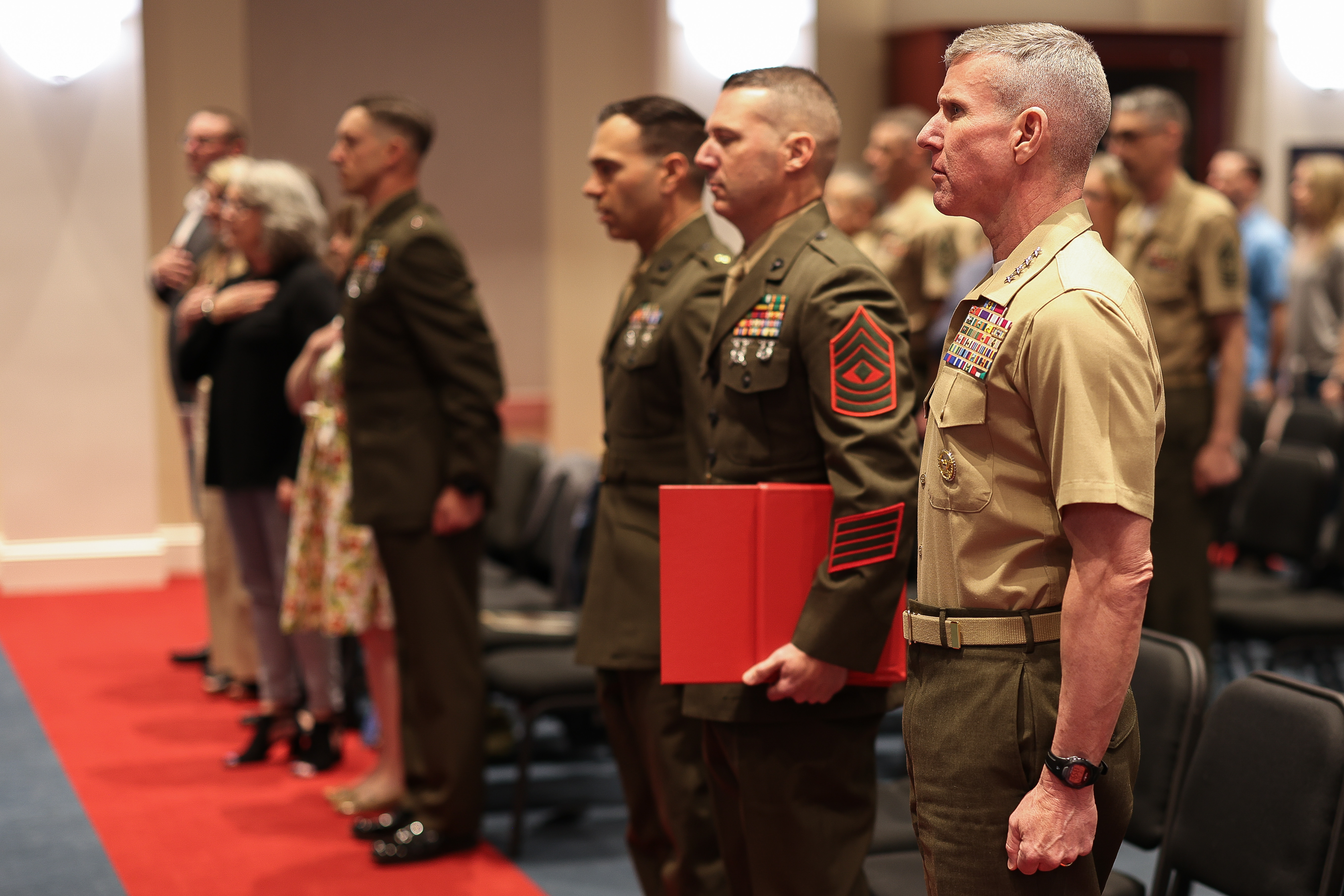 Service members standing in line.
