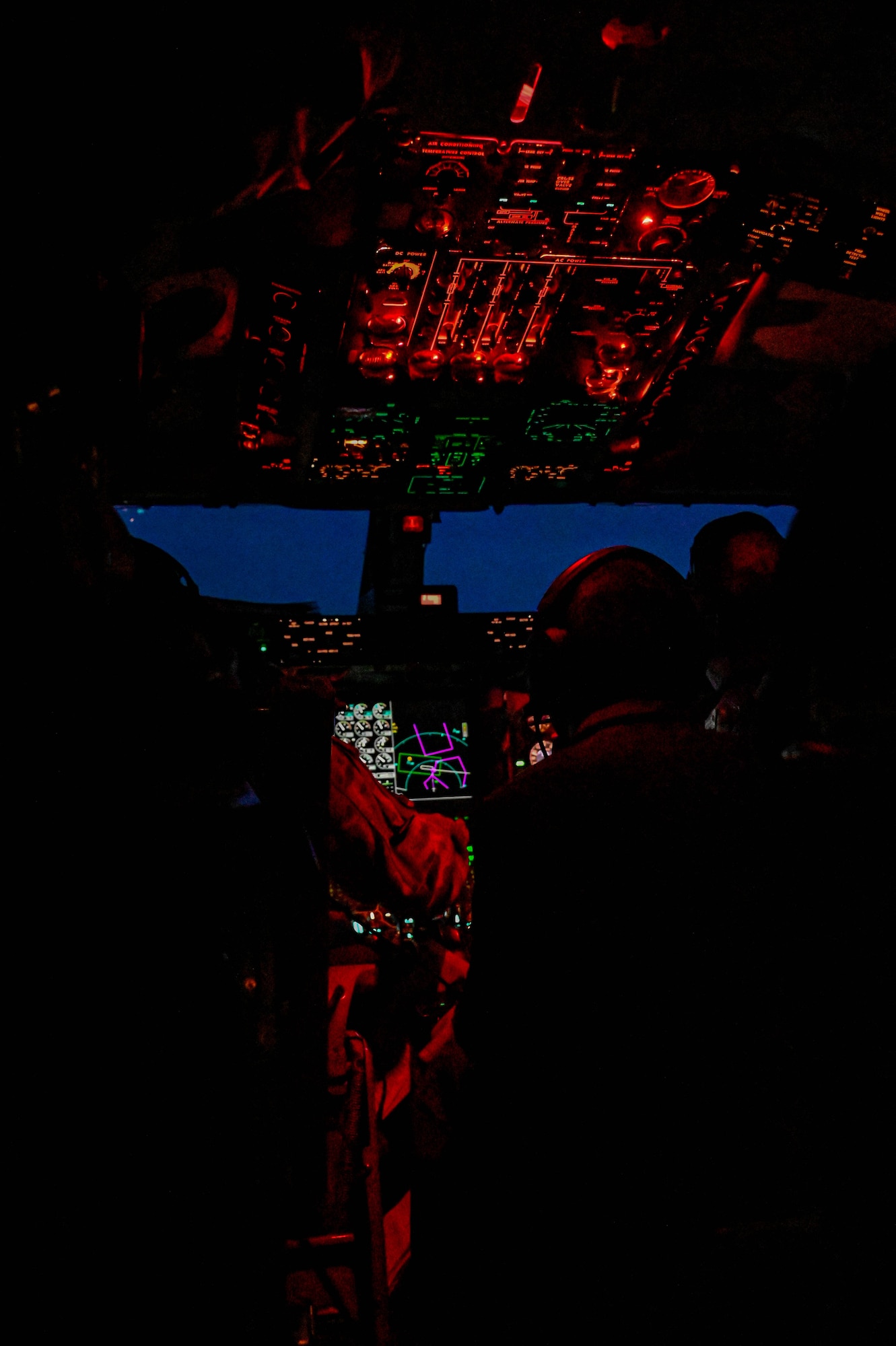 KC-135 Pegasus pilots sit in the cockpit during Task Force Red Mammoth, April 28, 2022. Airmen from Altus Air Force Base, Oklahoma, participated in the event alongside aircrew members from various Air National Guard units. (U.S. Air Force photo by Senior Airman Kayla Christenson)