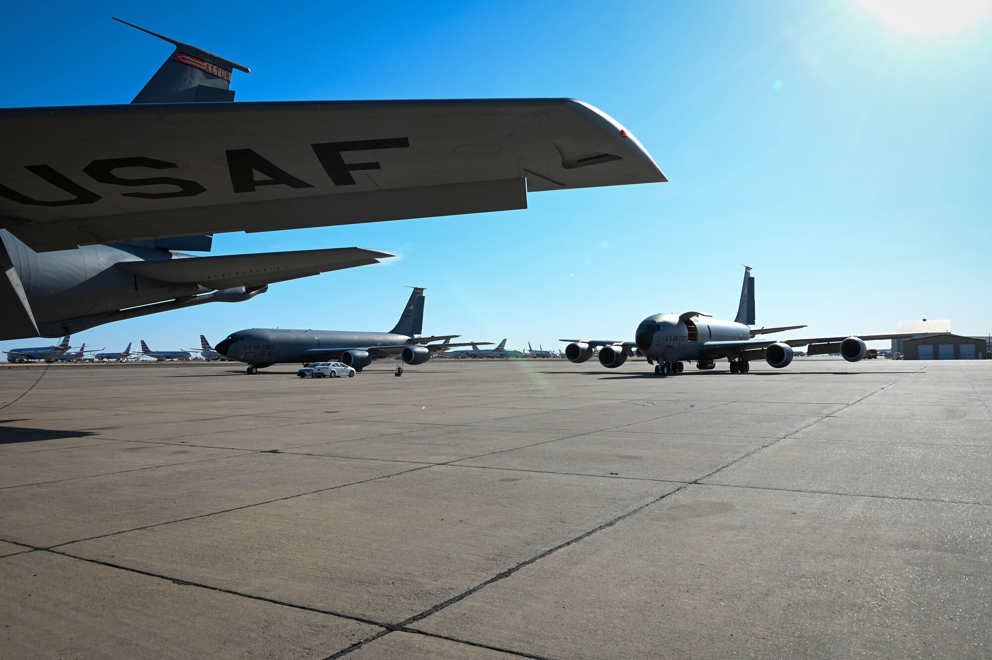 A group of three KC-135 Stratotankers from the 54th Air Refueling Squadron at Altus Air Force Base, Oklahoma, sit on the flightline at Roswell Airport, New Mexico, April 28, 2022. During Task Force Red Mammoth, KC-135 aircrew received in-flight training including air refueling and patterns. (U.S. Air Force photo by Senior Airman Kayla Christenson)