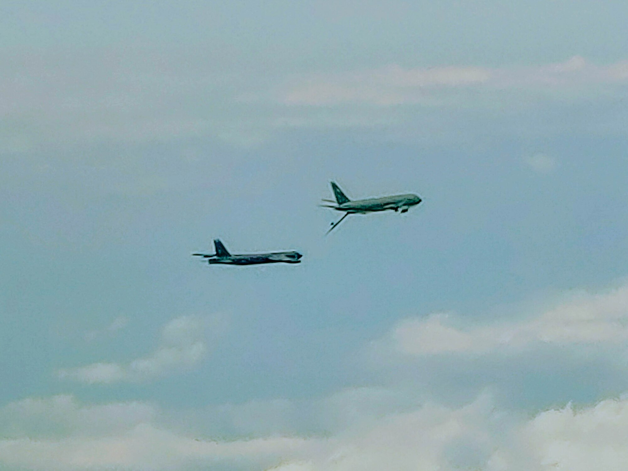 A KC-46 Pegasus from the 56th Air Refueling Squadron and a B-52 Stratofortress from the 20th Bomb Squadron prepare to perform air refueling near Barksdale Air Force Base (AFB), Louisiana, April 25, 2022. During the week, the 18 aircraft accomplished 25% of Altus Air Force Base, Oklahoma’s, daily operations in three off-base locations, while the remaining 75% percent of required aircrew training remained in the local area. (Courtesy photo)