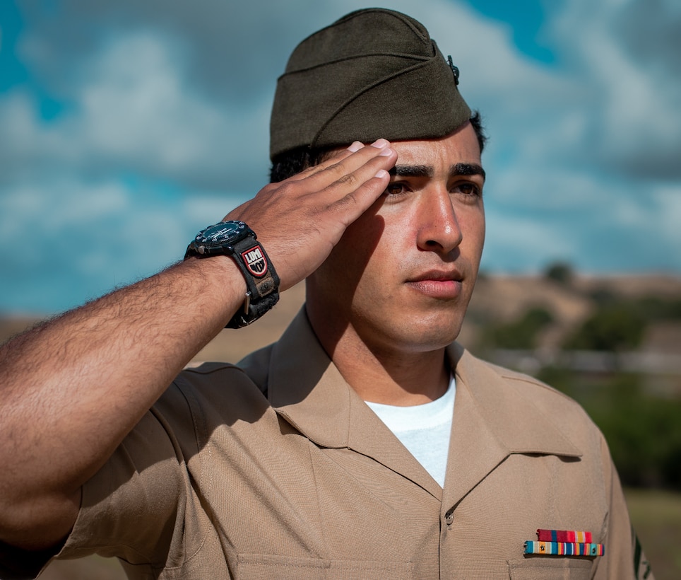 U.S. Marine Cpl. Brunacini, a rifleman with Echo Company, 2nd Battalion, 5th Marine Regiment, 1st Marine Division, salutes during his award ceremony at Range 214 on Marine Corps Base Camp Pendleton, California, April 22, 2022. Brunacini, who is currently serving as a block noncommissioned officer with MCB Camp Pendleton’s Range Operations Division, earned a Navy and Marine Corps Commendation Medal for heroic actions taken after he helped save the life of a man wounded in a drive-by shooting in Lemon Grove, California. (U.S. Marine Corps photo by Lance Cpl Hope Straley)