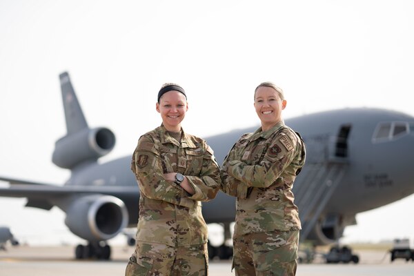 Master Sgt. Blakeley Murdock, 60th Air Mobility Wing Commander’s Action Group superintendent and 6th Aerial Refueling Squadron KC-10 Extender flight engineer, and Master Sgt. Sarah Murdock, 60th Maintenance Squadron precision measurement equipment laboratory quality manager, participate in Military Spouse Appreciation Day campaign at Travis Air Force Base, Calif., March 31, 2022. May 6th is Military Spouse Appreciation Day and Travis AFB is celebrating by highlighting the resiliency and commitment of spouses in the military community. (U.S. Air Force photo by Chustine Minoda)