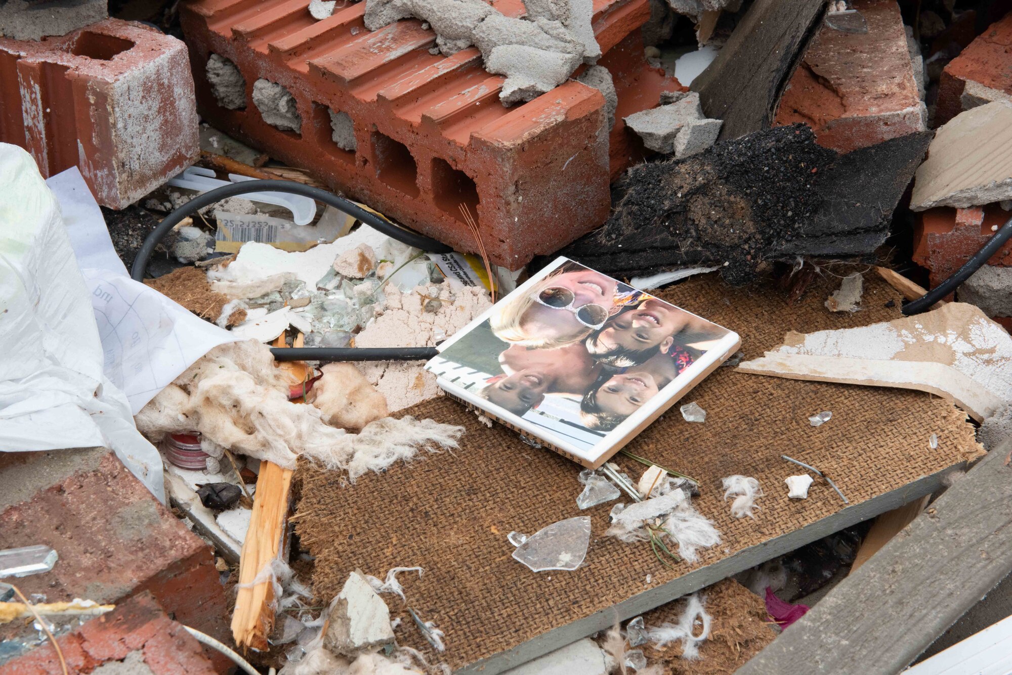 A broken coaster lays in a pile of debris on May 3, 2022 as a result of a tornado in Andover, Kansas.