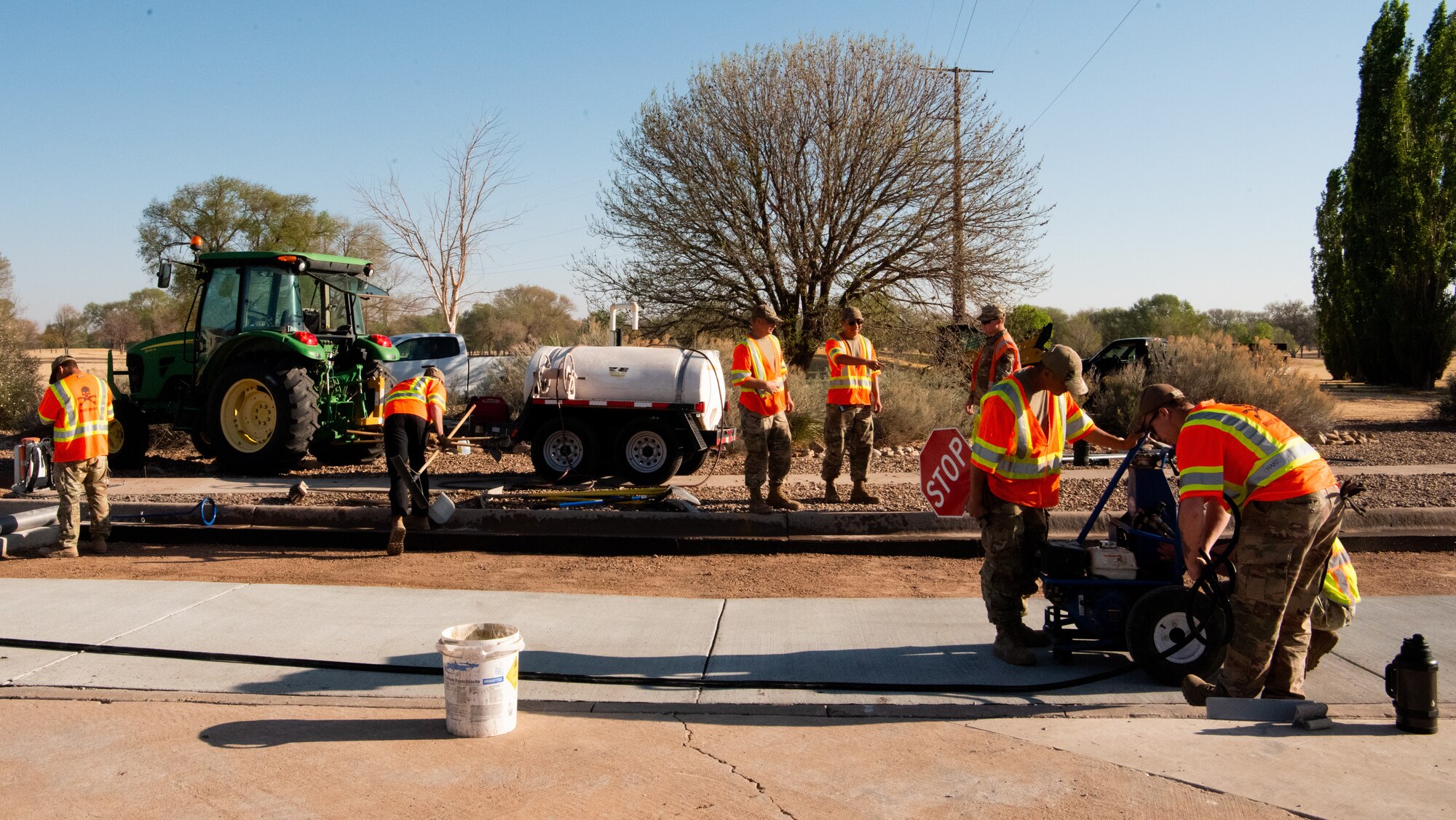 U.S Airmen work on smoothing out the ground before concrete is poured.