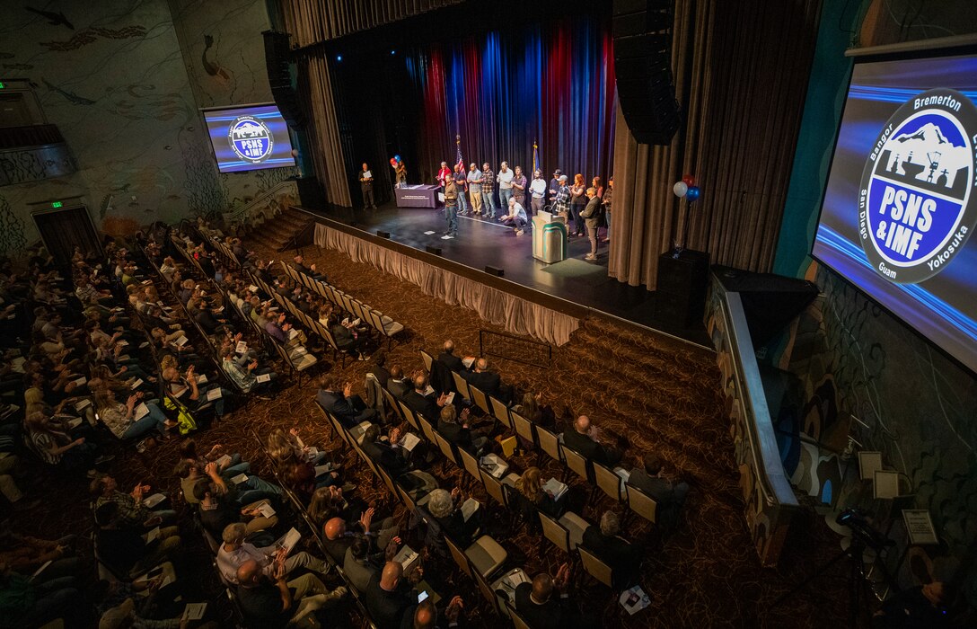 An 2021 Employee of the Year recognition ceremony for Puget Sound Naval Shipyard & Intermediate Maintenance Facility, was held at the Admiral theater in Bremerton, Washington, May 3, 2022. Capt. Jip Mosman, PSNS & IMF commander, presented the awards. (U.S. Navy photo by Wendy Hallmark)
