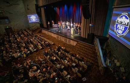 An 2021 Employee of the Year recognition ceremony for Puget Sound Naval Shipyard & Intermediate Maintenance Facility, was held at the Admiral theater in Bremerton, Washington, May 3, 2022. Capt. Jip Mosman, PSNS & IMF commander, presented the awards. (U.S. Navy photo by Wendy Hallmark)