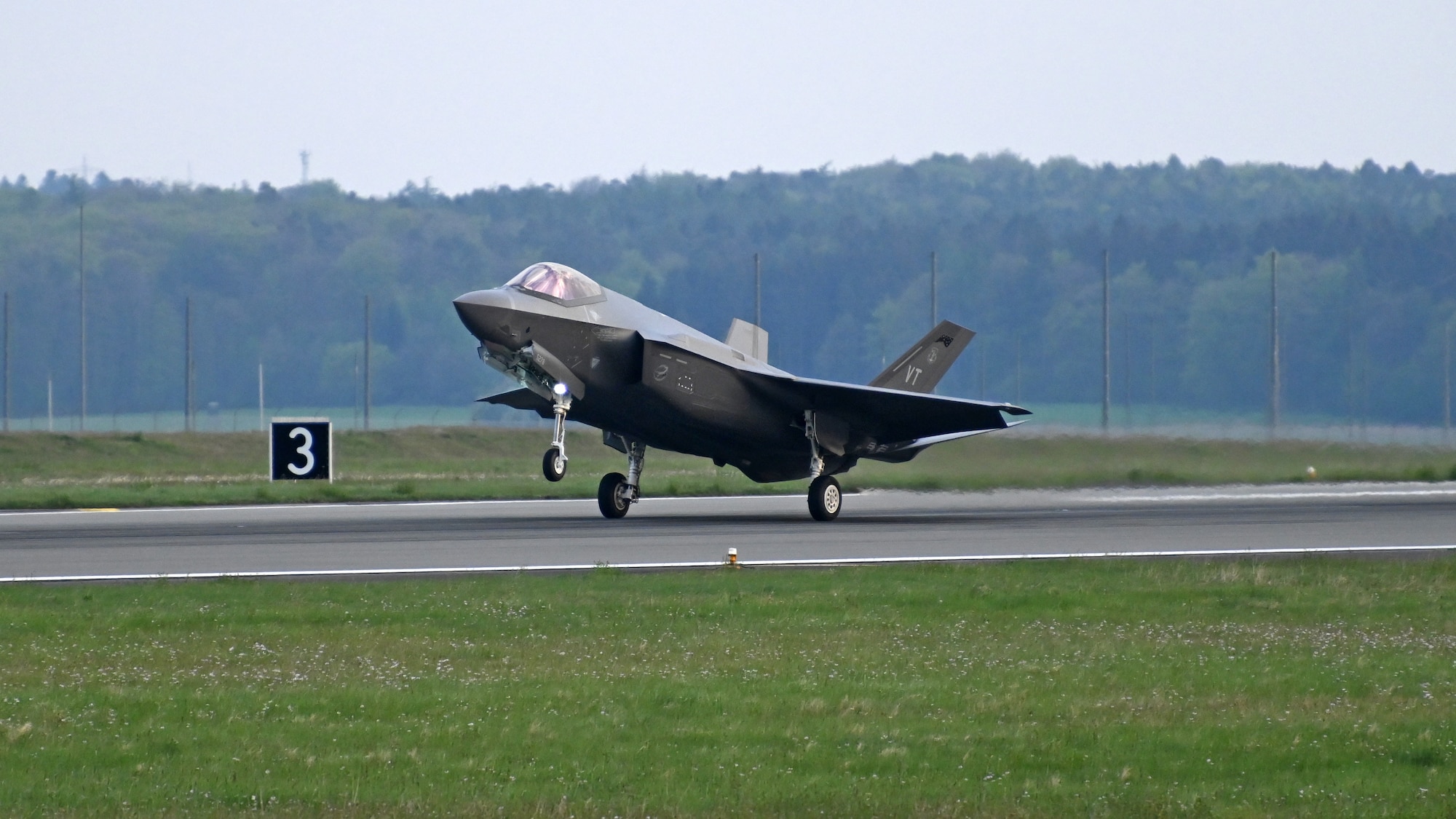 A U.S. Air Force F-35A Lightning II fifth generation fighter aircraft, assigned to the Vermont Air National Guard’s 158th Fighter Wing, lands at Spangdahlem Air Base, Germany, May 02, 2022. The Vermont Air National Guard team will take over the Enhanced Air Policing mission for Hill Air Force Base’s 388th Fighter Wing,  continuing NATO’s Enhanced Air Policing mission along the Eastern flank. (U.S. Air Force photo by Tech. Sgt. Anthony Plyler)